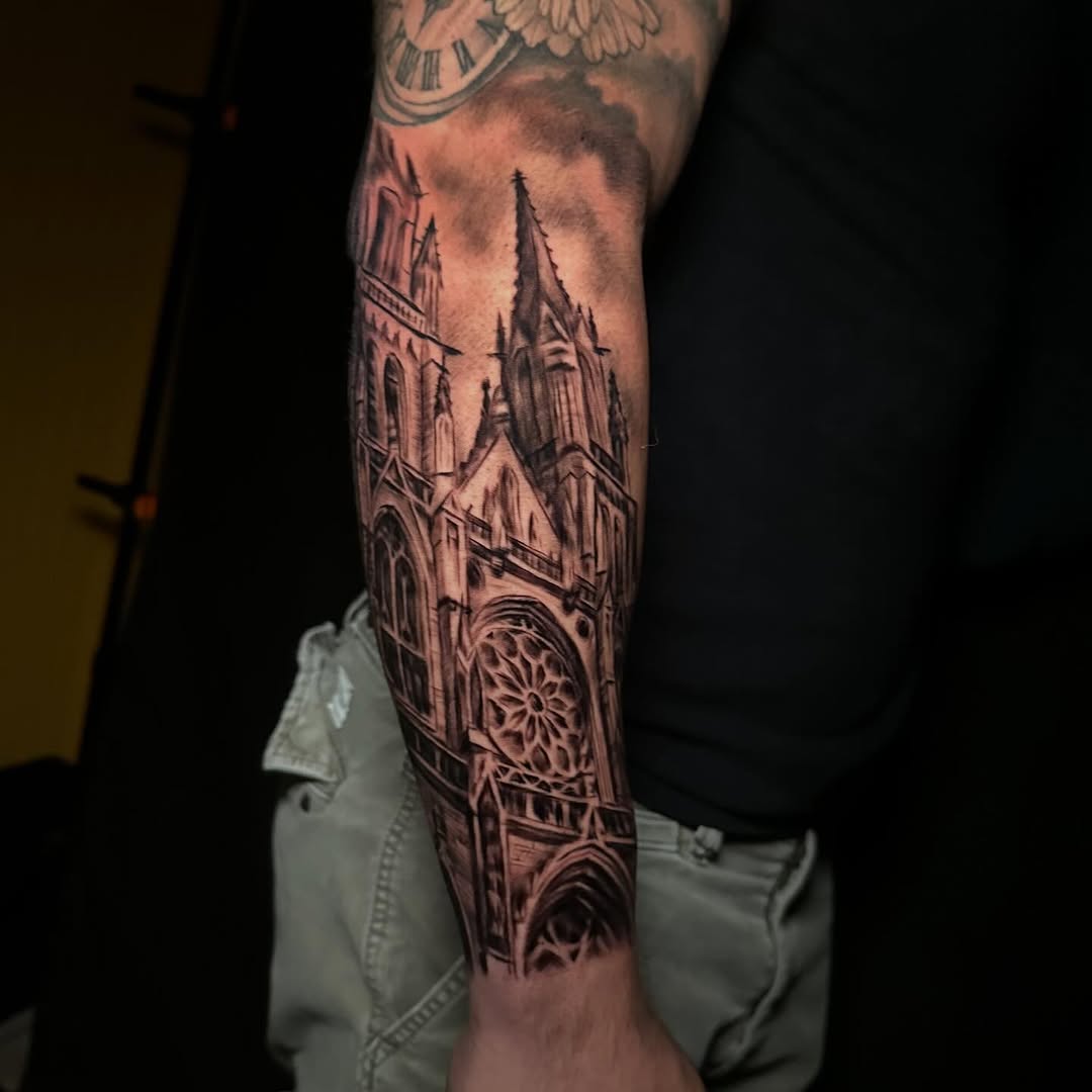 Gothic cathedral architecture dark art tattoo on the forearm by Comfy Chris Fettig