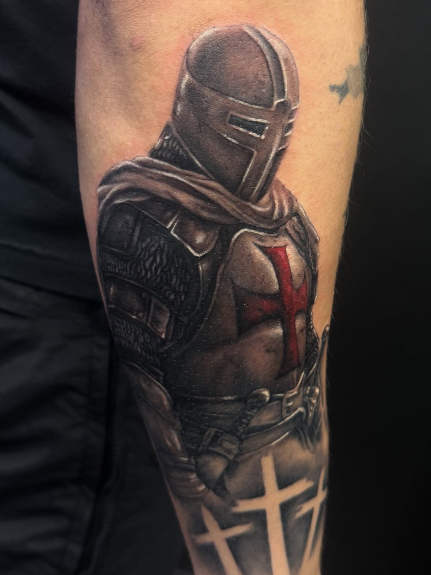 Knights templar realism tattoo on the forearm by Kiefer Fonseca