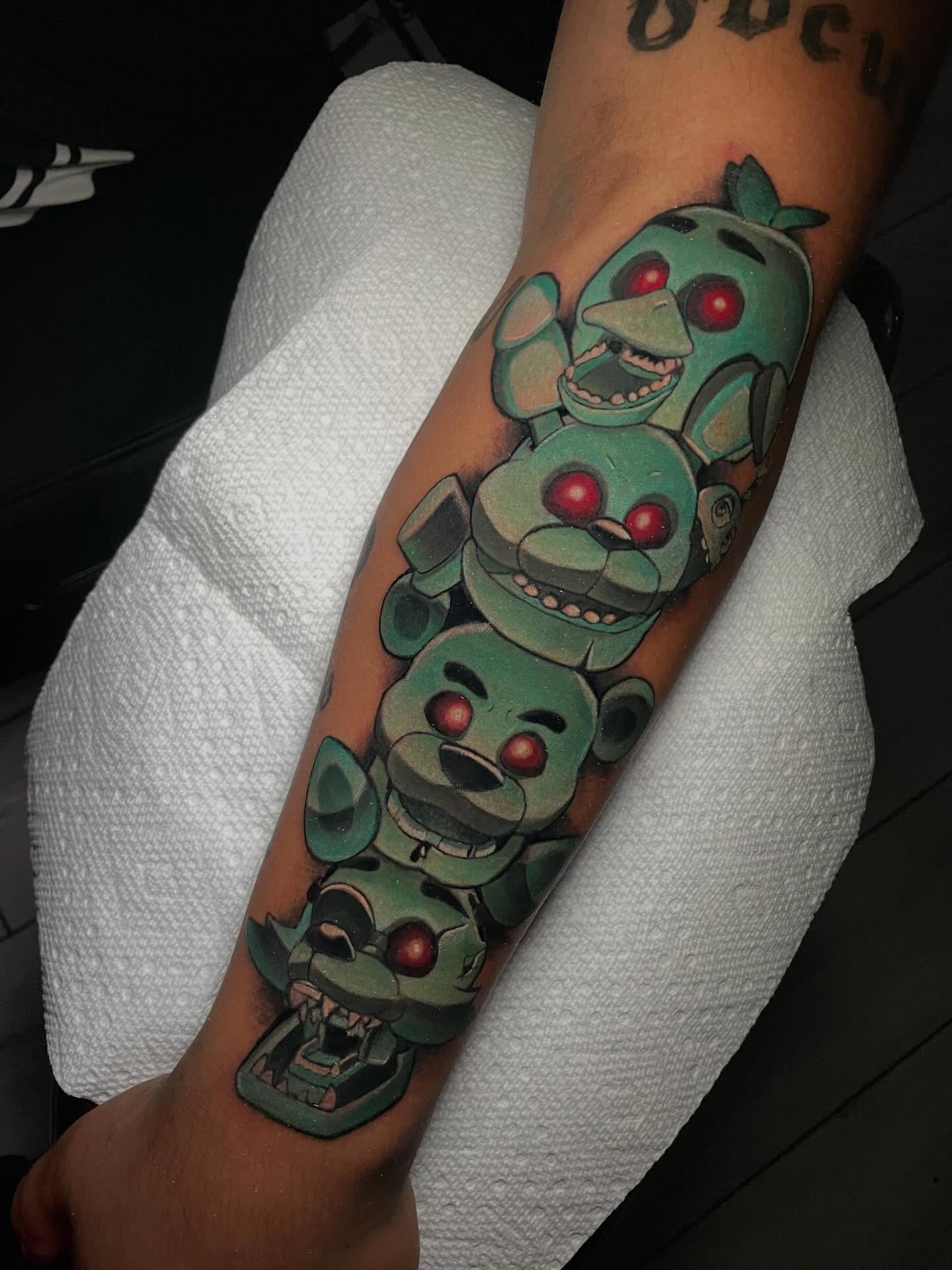 Robot heads dotwork tattoo on the forearm by Kenneth Ruiz