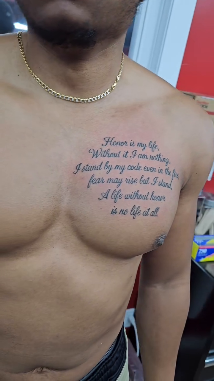 Chest script tattoo Chicano tattoo on the chest by John Briceño, Columbus, Ohio