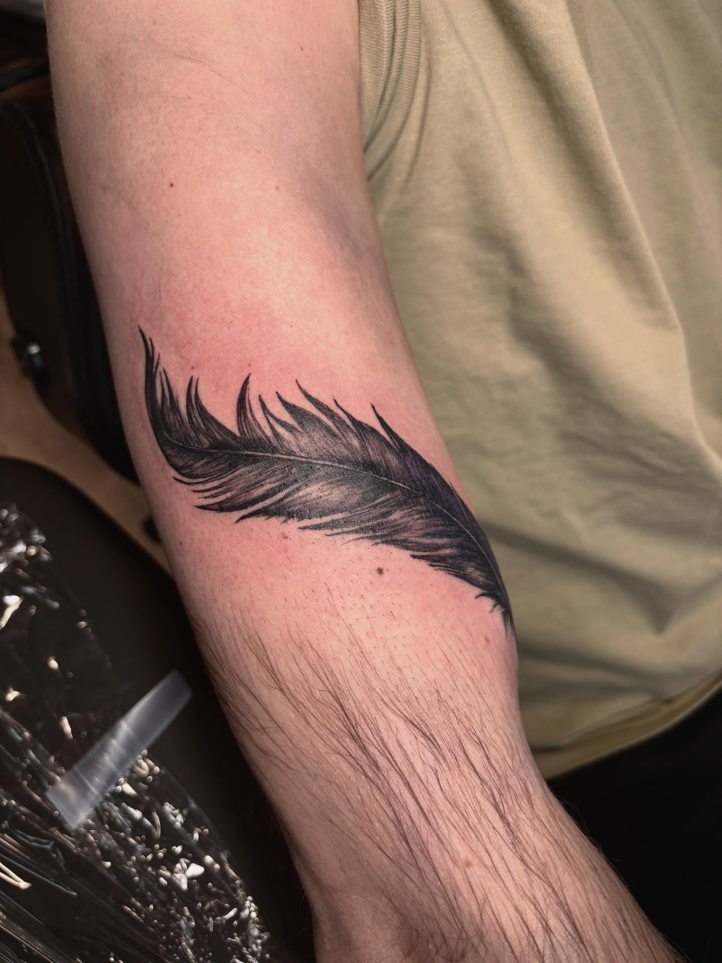 Feather black and grey tattoo on the forearm by Sage Ray ♡