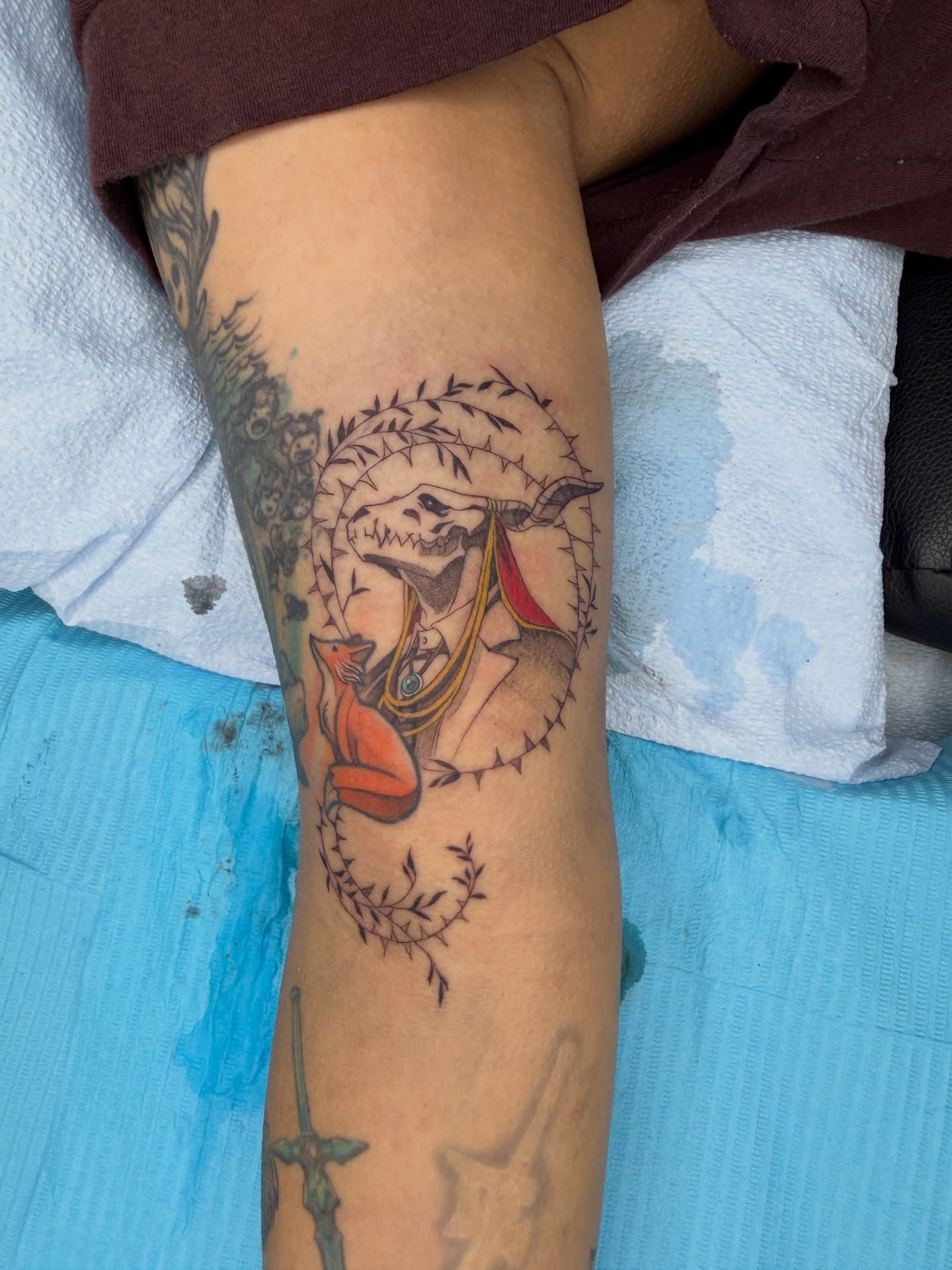Skull with thorns neo-traditional tattoo on the forearm by Melissa Rose Moya