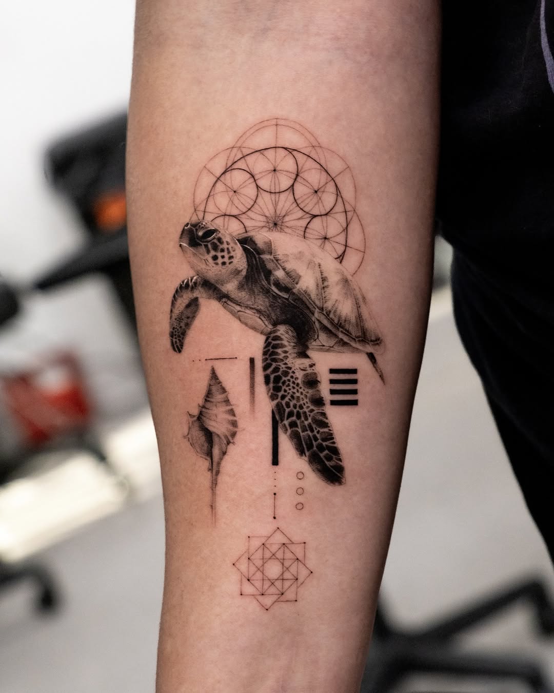 Tattoo by @turner_tattoos — realism, geometric