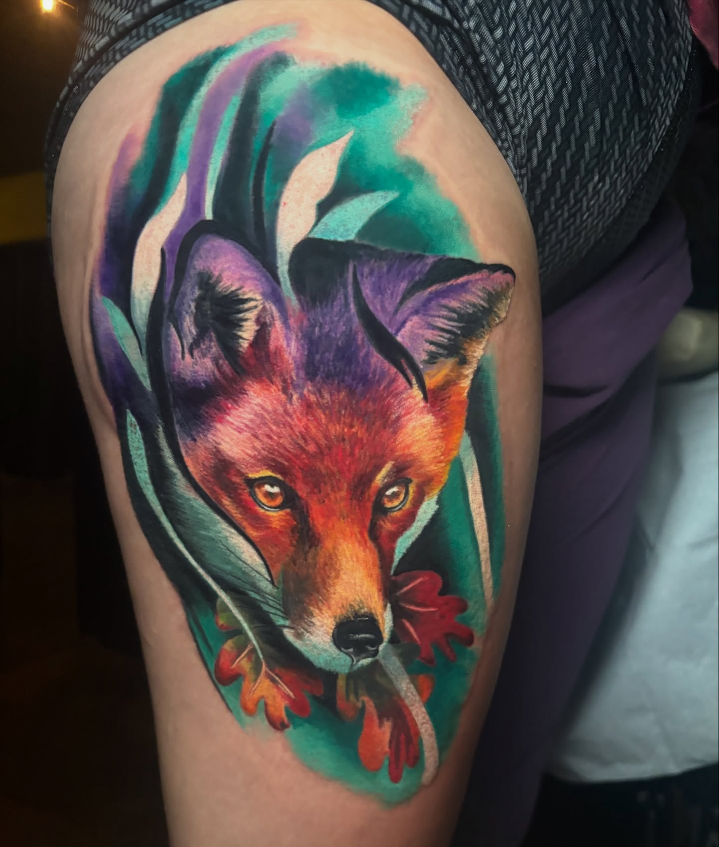 Fox watercolor tattoo on the thigh by Marianna Lombardi
