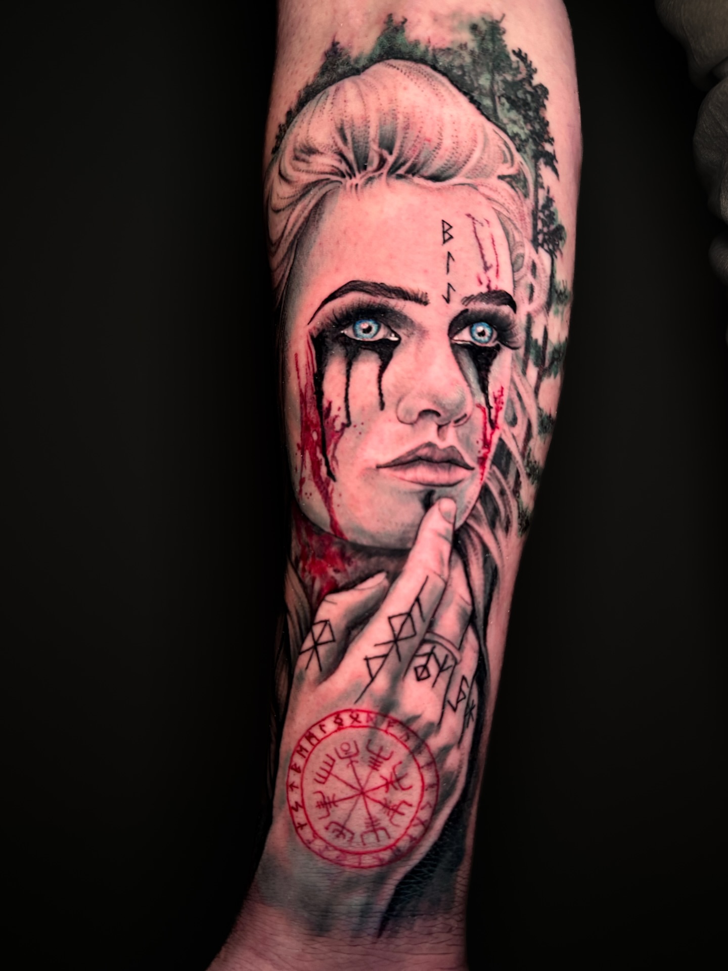 Woman's face realism tattoo on the forearm by Brandt Norcross