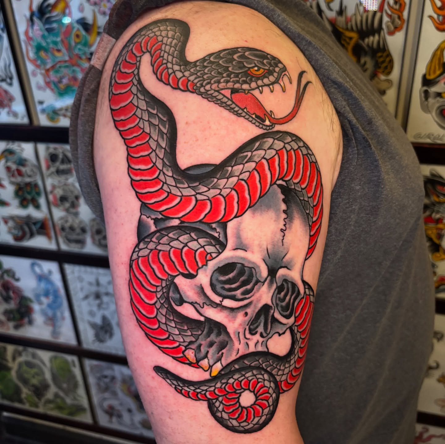 Snake and skull American traditional tattoo on the shoulder by Mike Maciejewski:Chicago Tattoo Artist