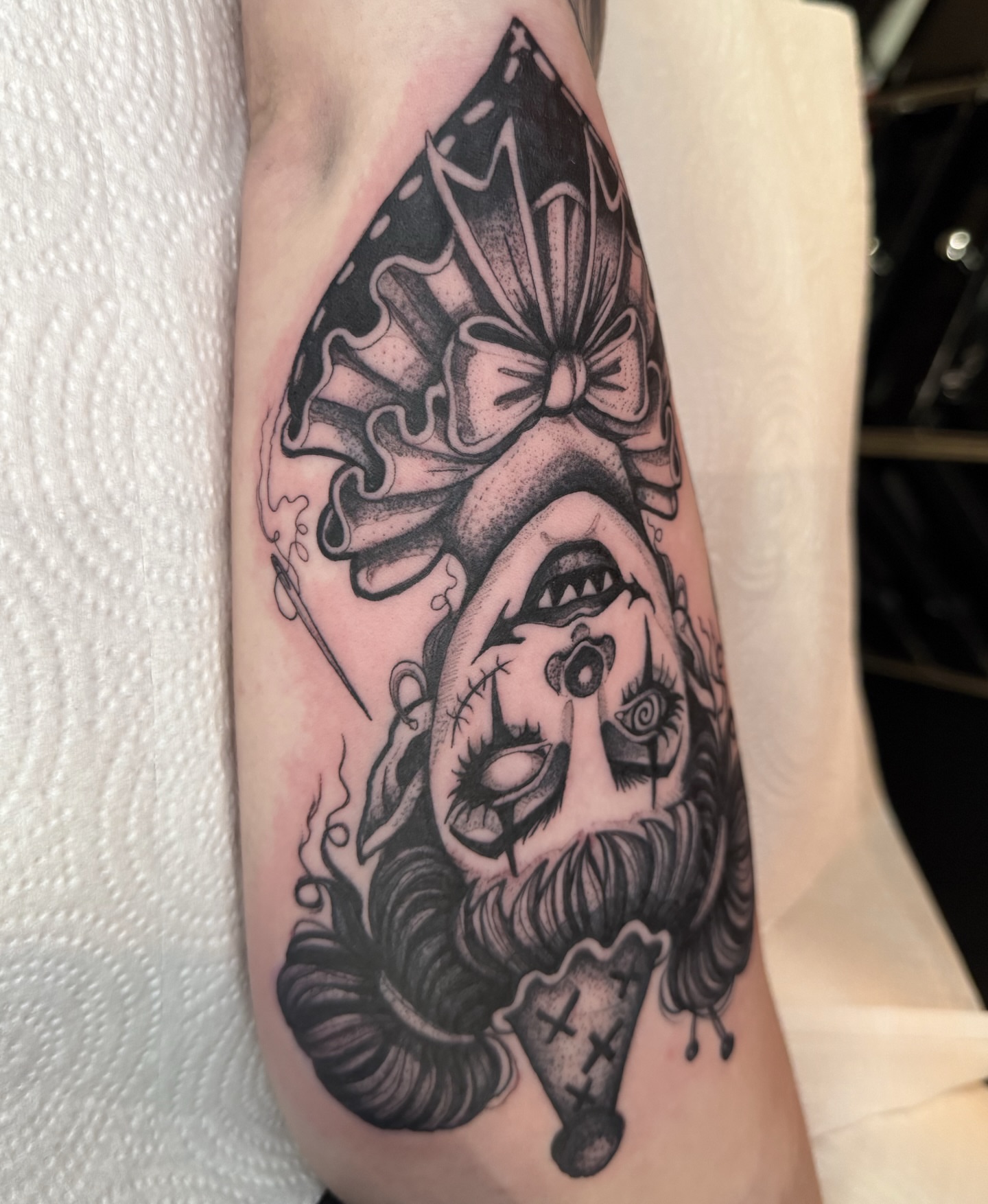 Clown American traditional tattoo on the forearm by amanda malia wega