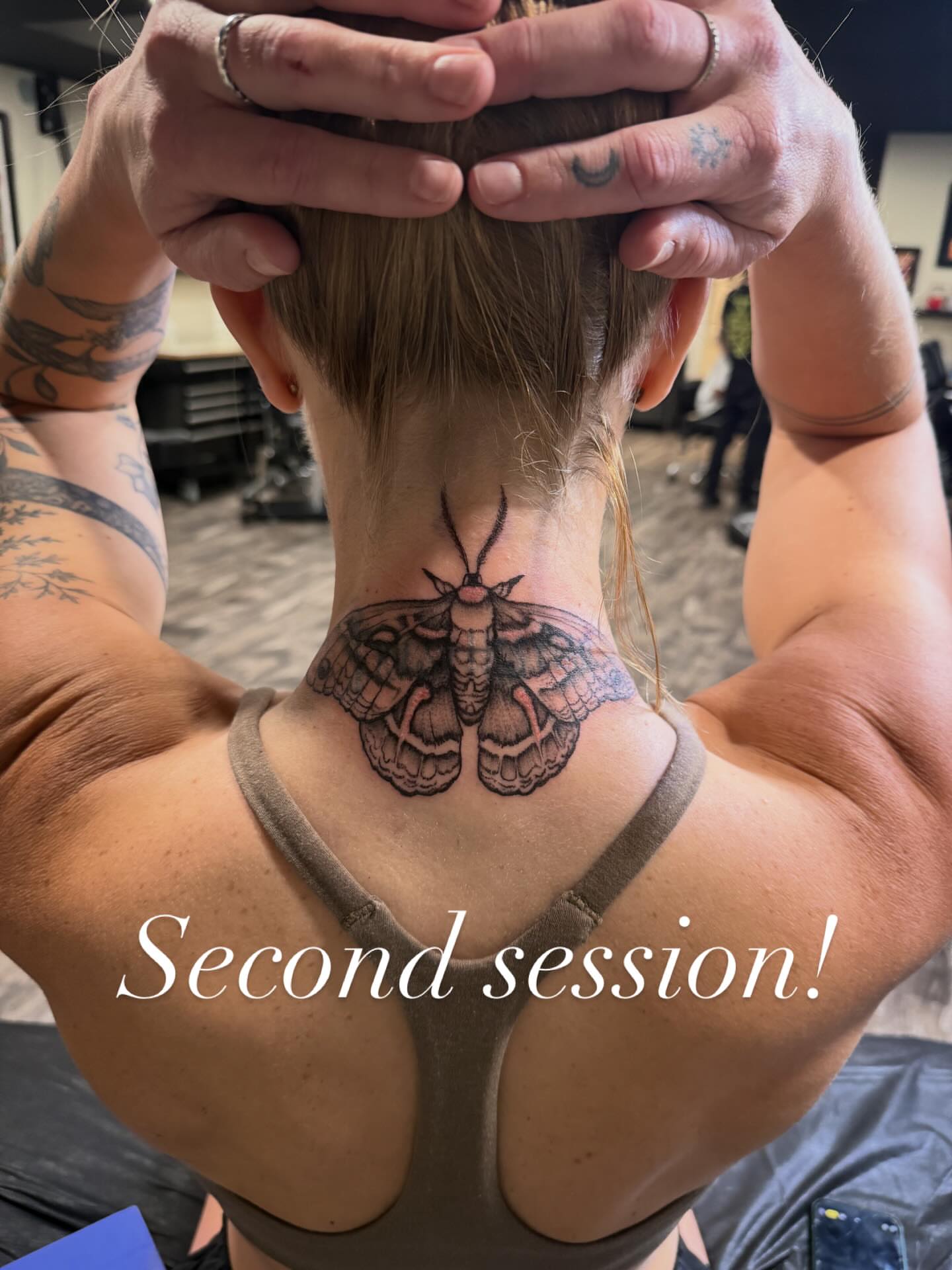 Moth black and grey tattoo on the neck by Brennan Walker, Orem, Utah