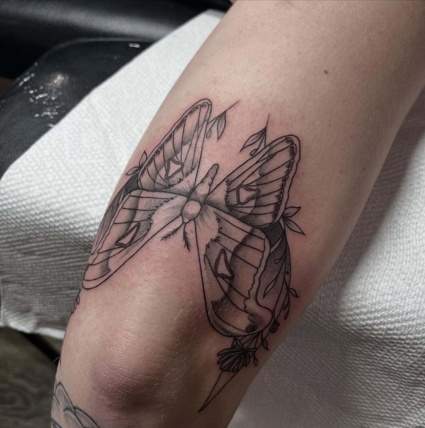 Butterfly black and grey tattoo on the forearm by Ty’s Tattoos