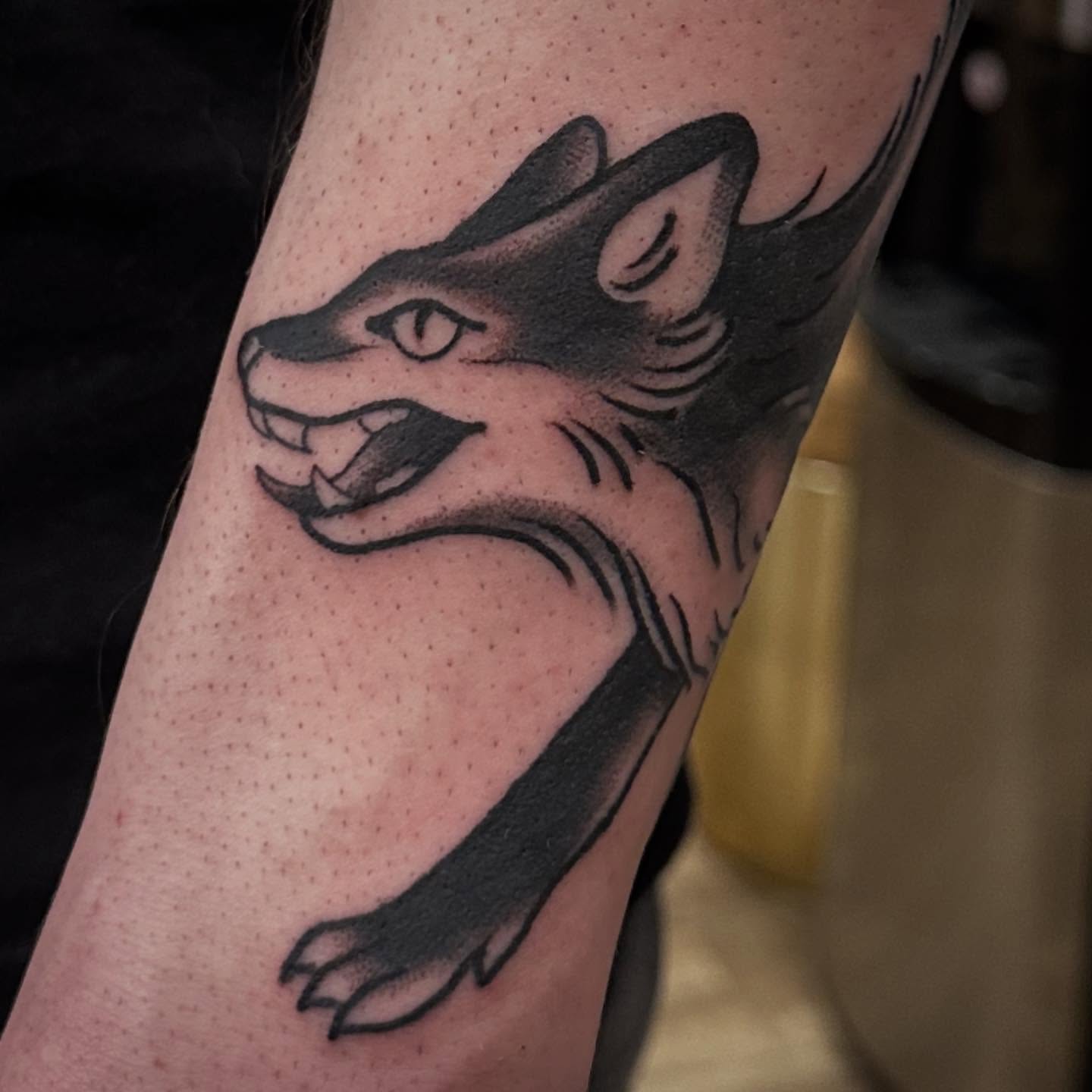 Fox black and grey tattoo on the forearm by Alexa Wolfkiel