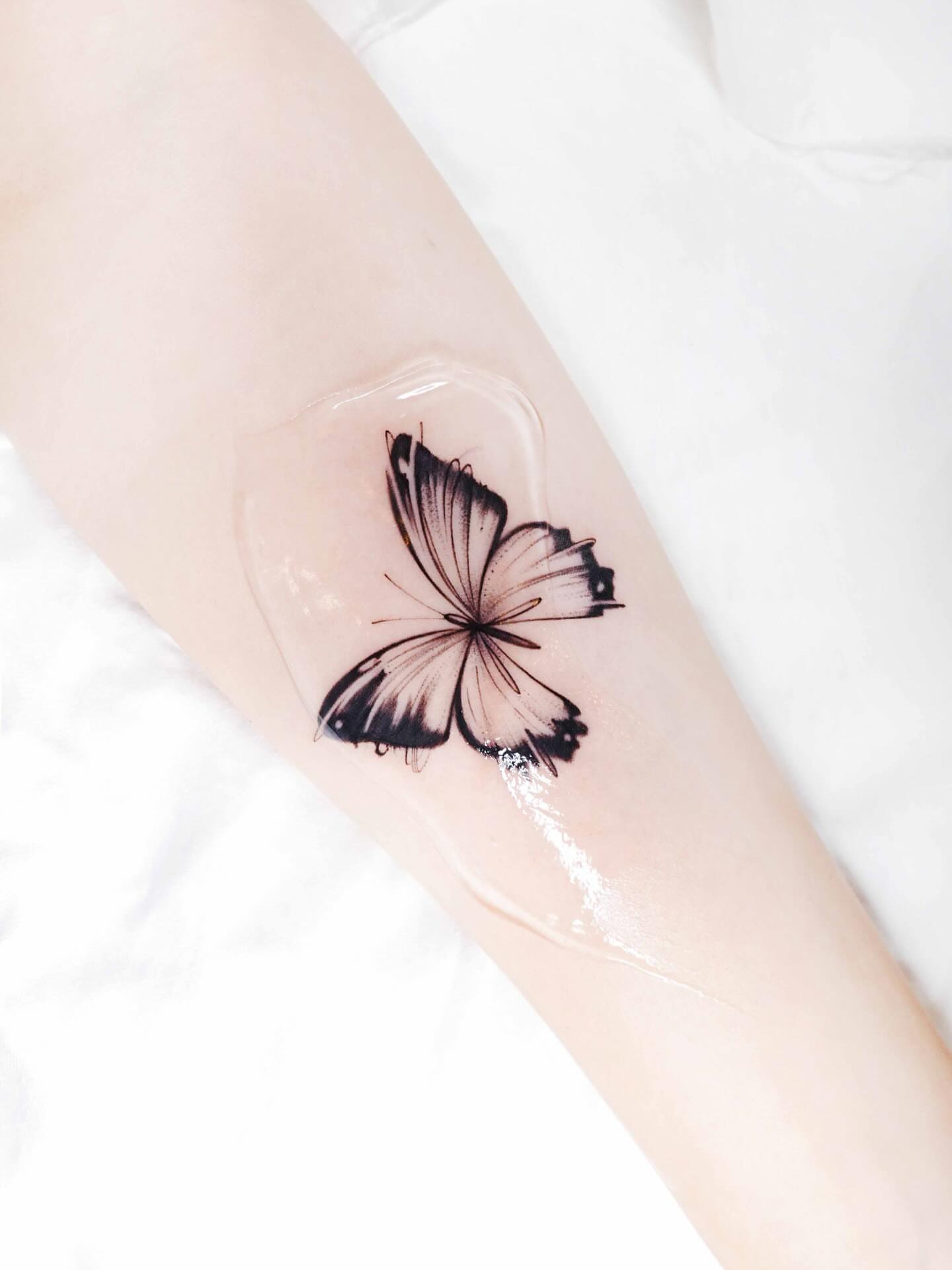 Butterfly realism tattoo on the forearm by 초현실과 현실 그 사이를 그리다.