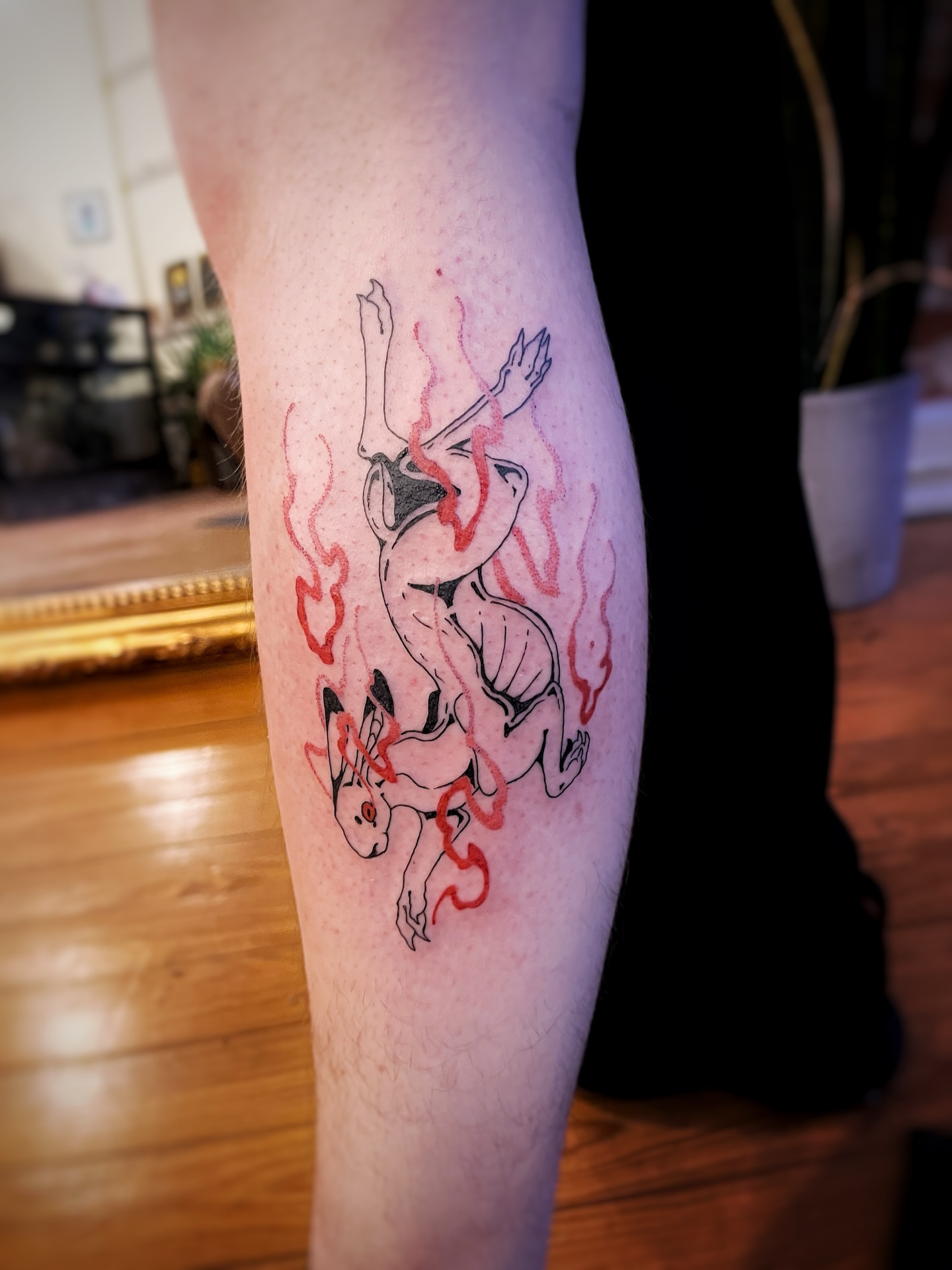 Demon dotwork tattoo on the forearm by Risa Cincinnati Tattoo Artist