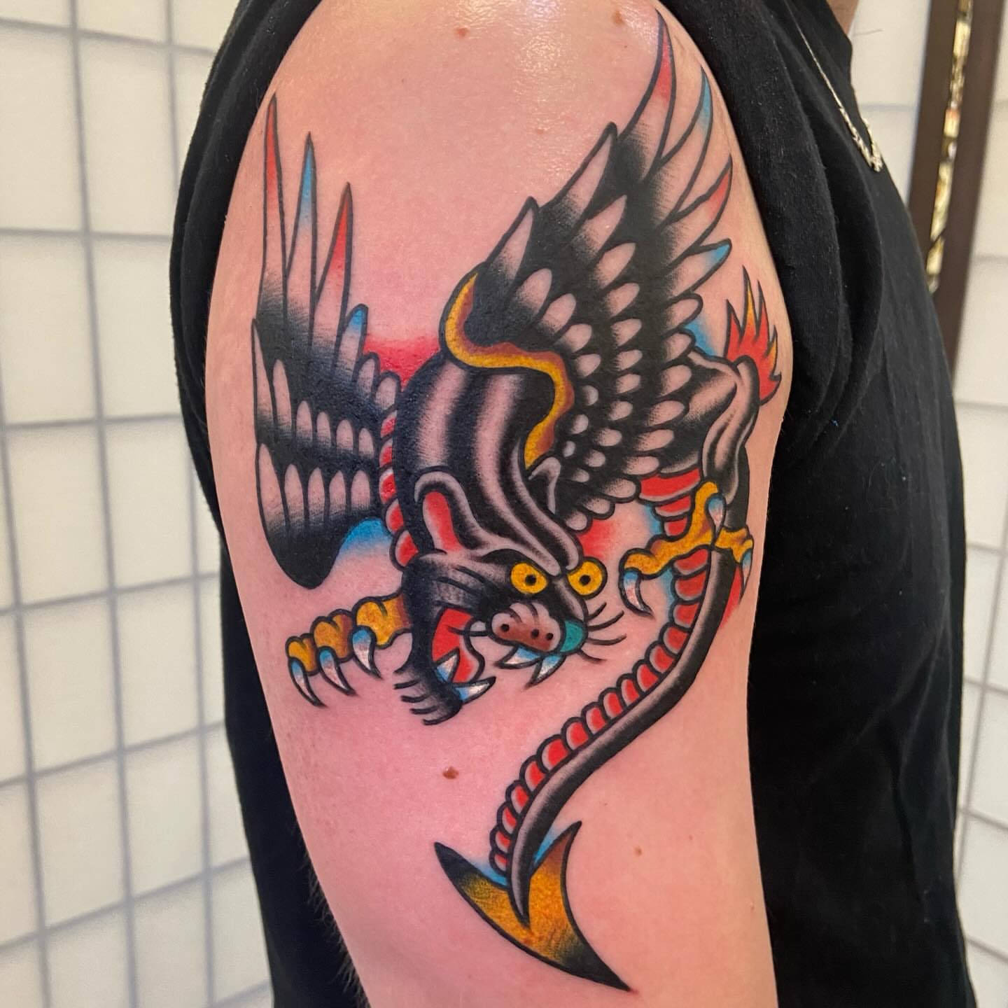 Dragon American traditional tattoo on the shoulder by Anthony Jaeger, Seattle, Washington