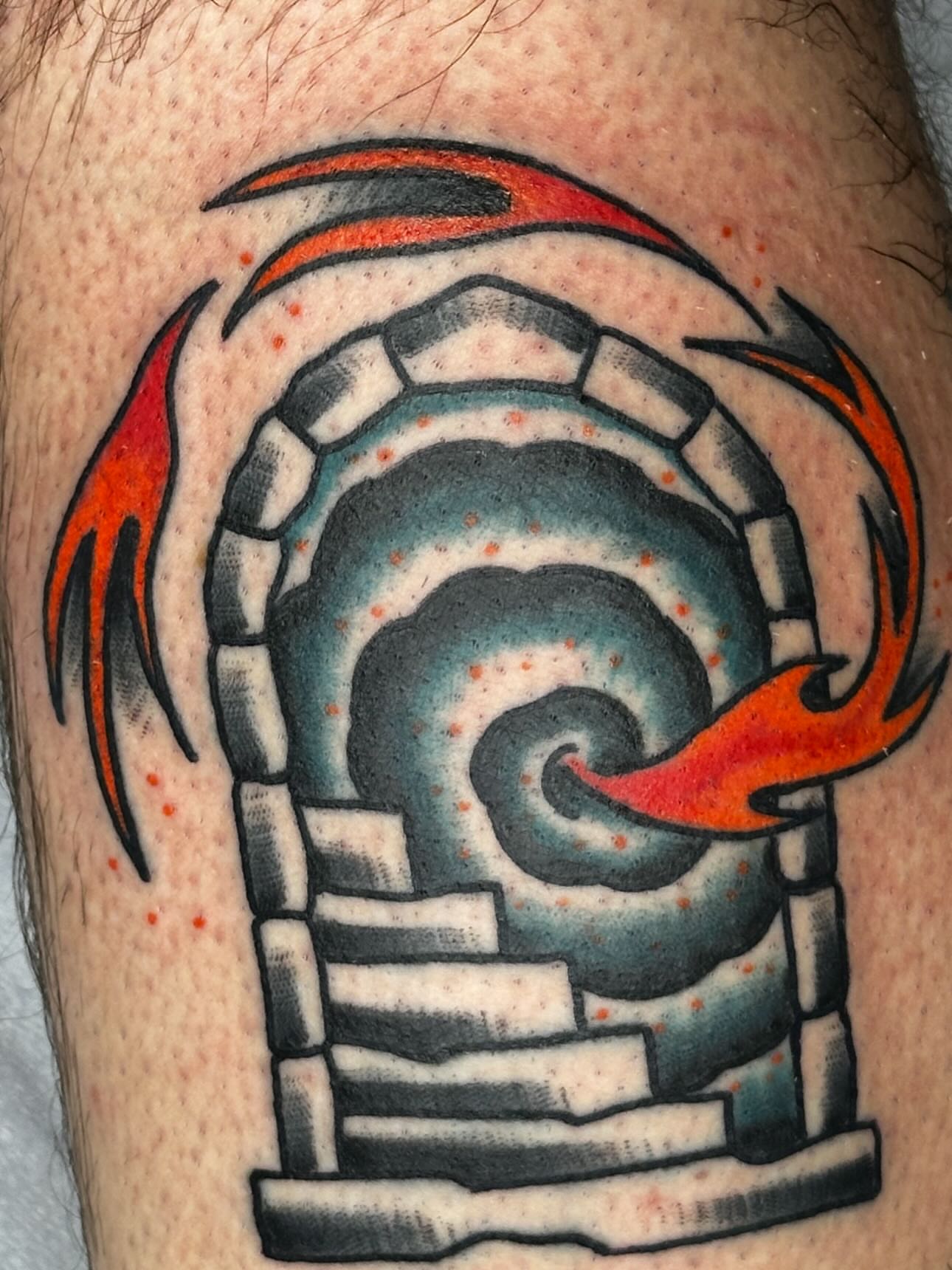Staircase with flame American traditional tattoo on the thigh by Stephen Galena