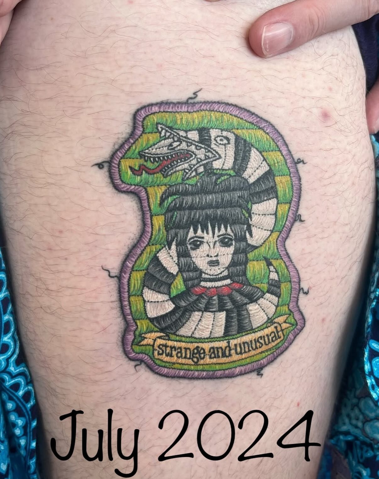Anime character with snake headdress anime tattoo on the thigh by Max
