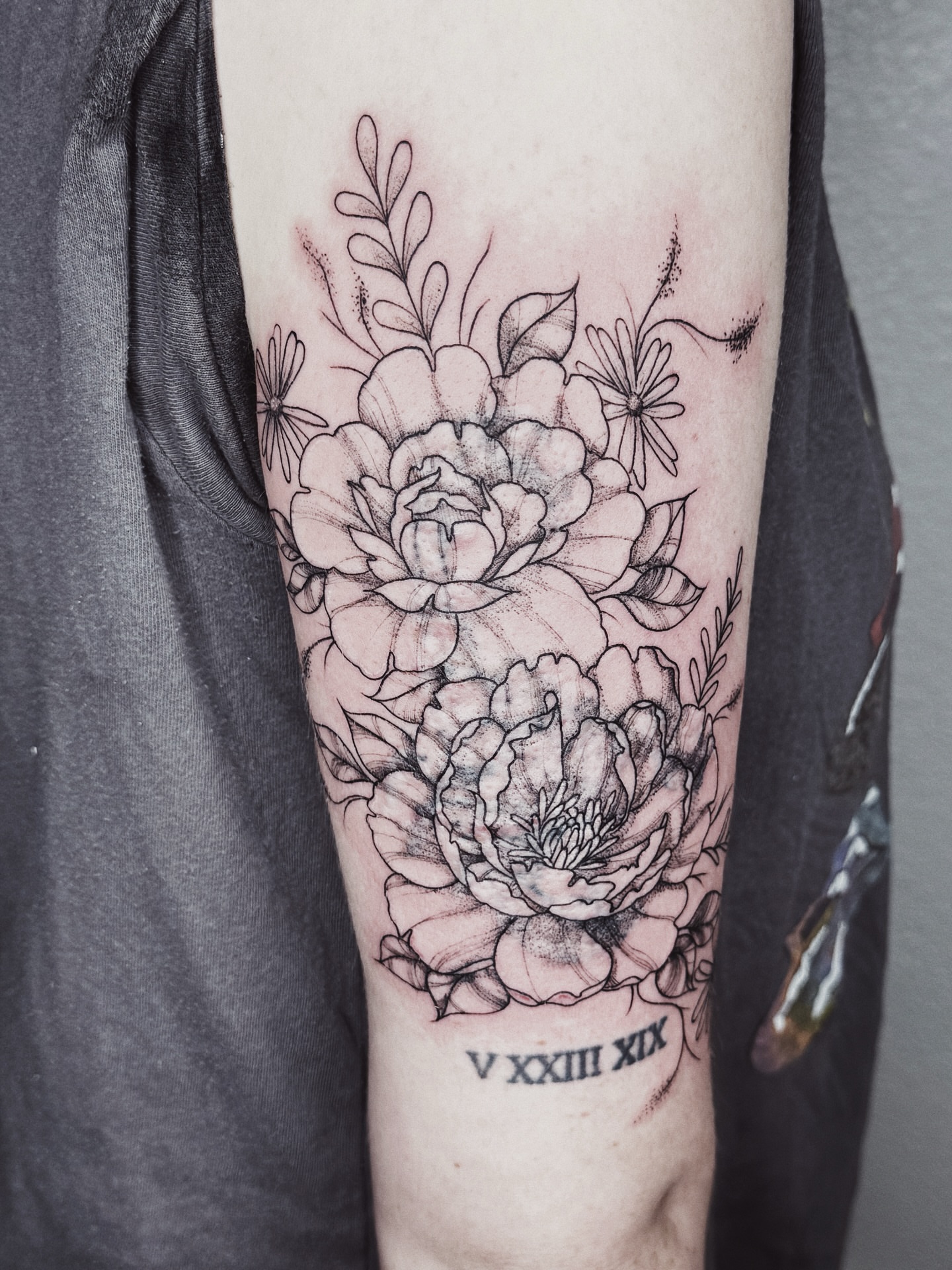 Floral bouquet black and grey tattoo on the forearm by πΉπ°π½πππ΄π½ πΆπ»π΄π½π½, North Logan, Utah