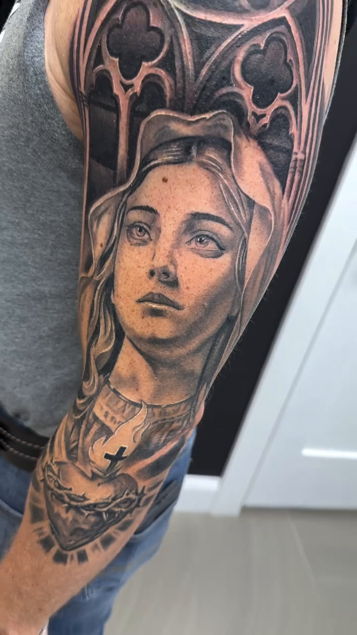 Virgin Mary with Sacred Heart realism tattoo by Steve Bishov