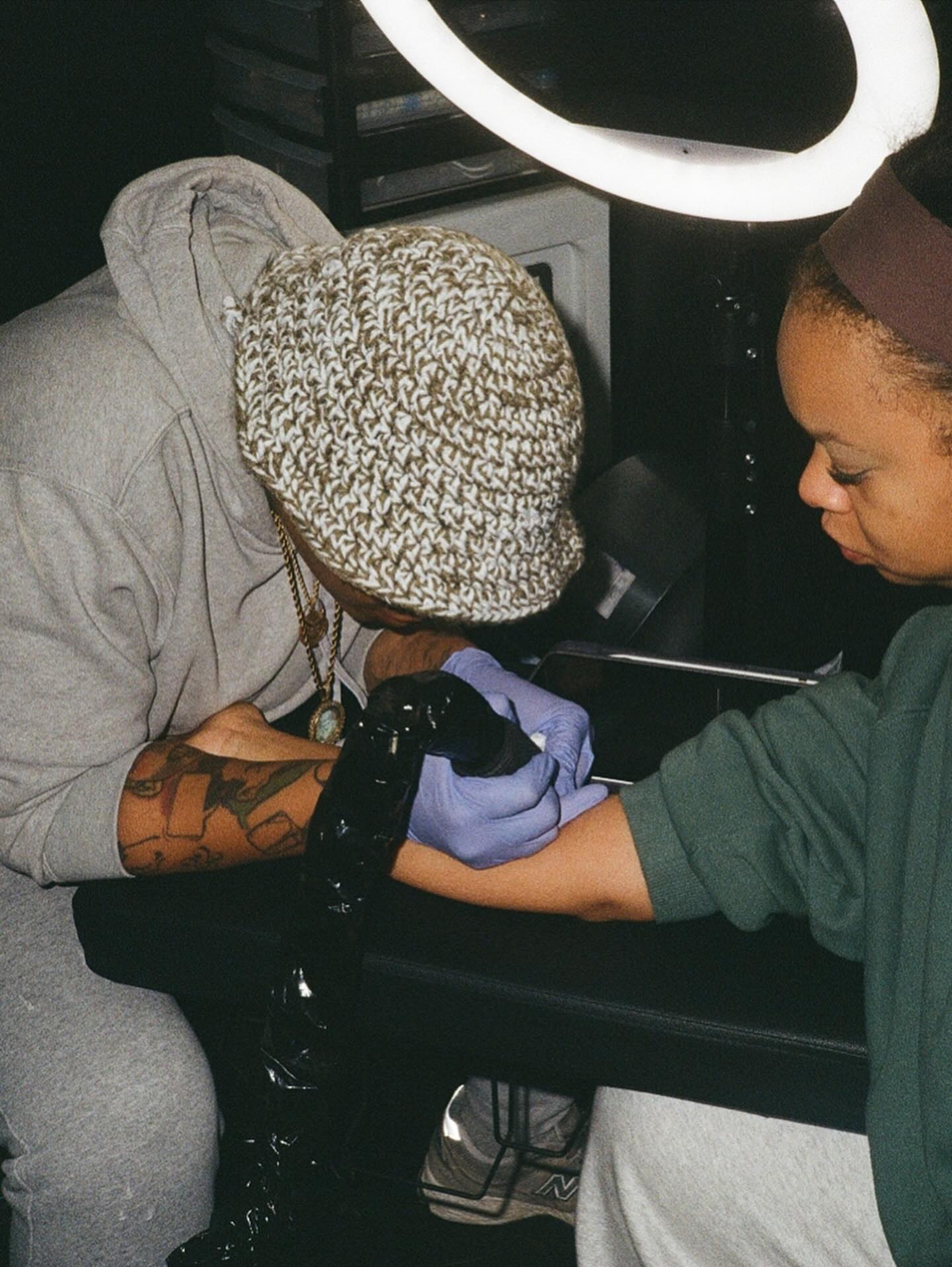 Tattoo artist American traditional tattoo on the upper arm by Jazz Walker