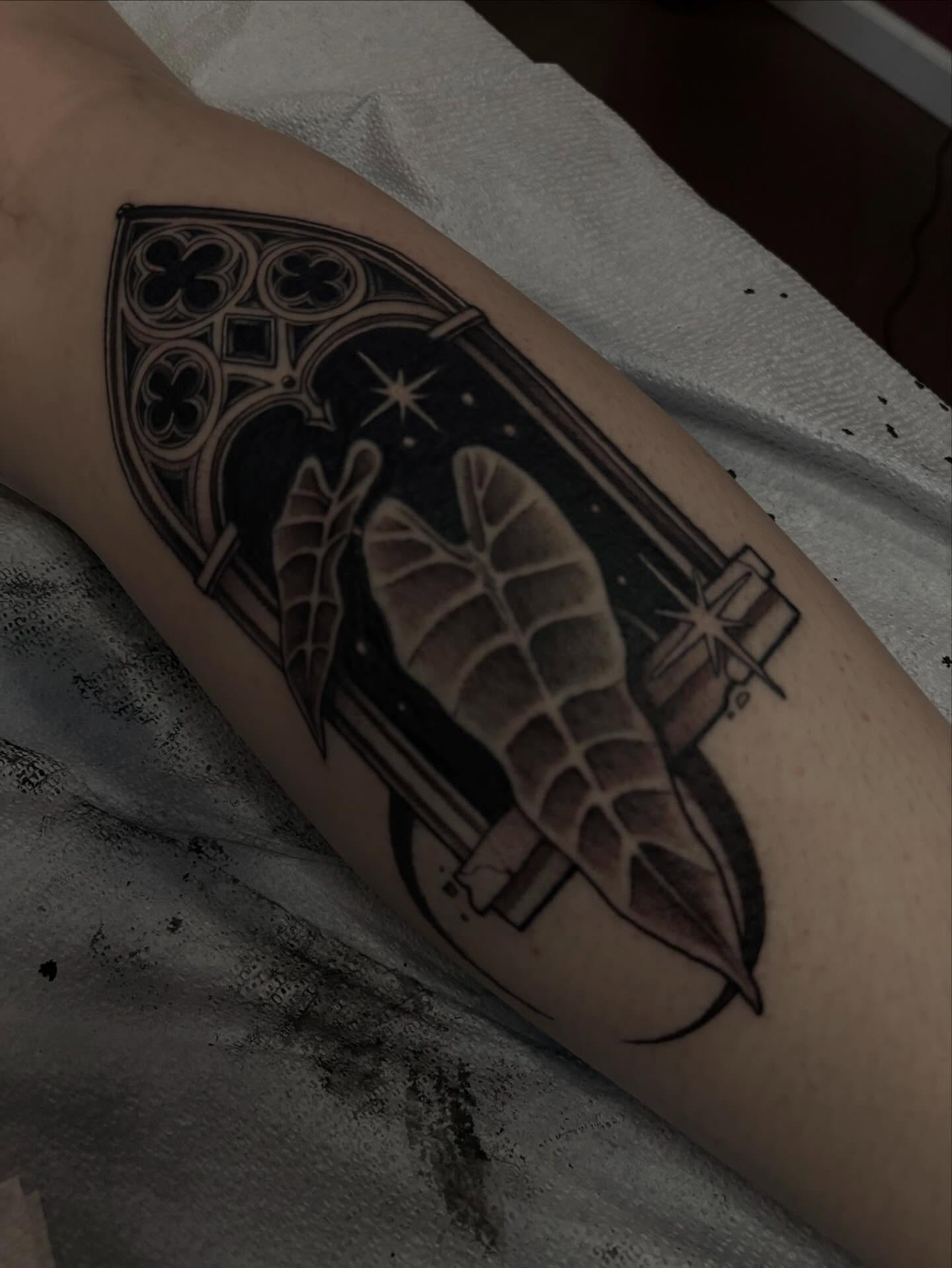 Stained glass window black and grey tattoo on the forearm by 𝔗𝔞𝔶𝔩𝔬𝔯 𝔈𝔩𝔦𝔷𝔞𝔟𝔢𝔱𝔥, Tulsa, Oklahoma