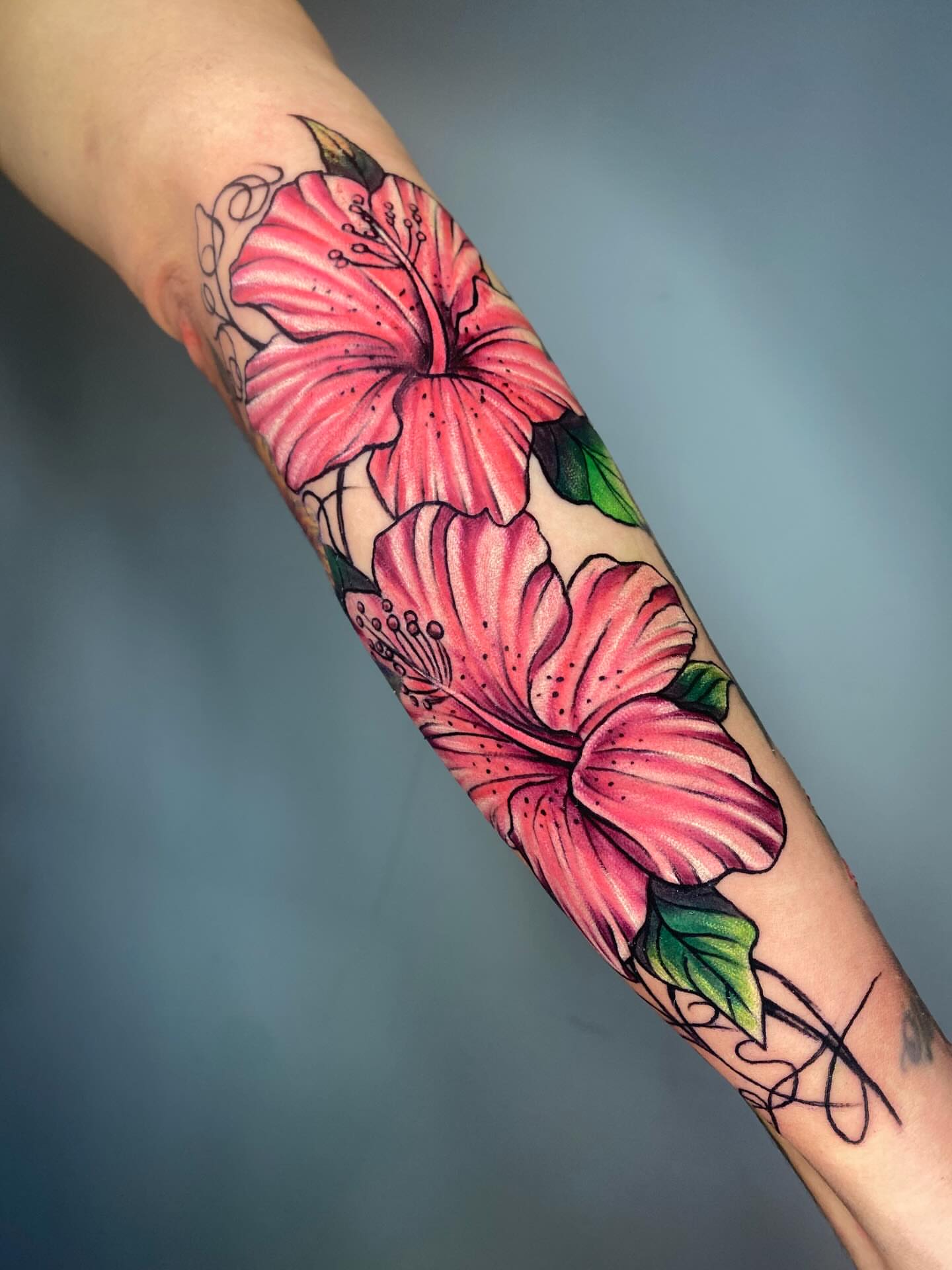 Hibiscus flowers dotwork tattoo on the forearm by Tattoo Medellin