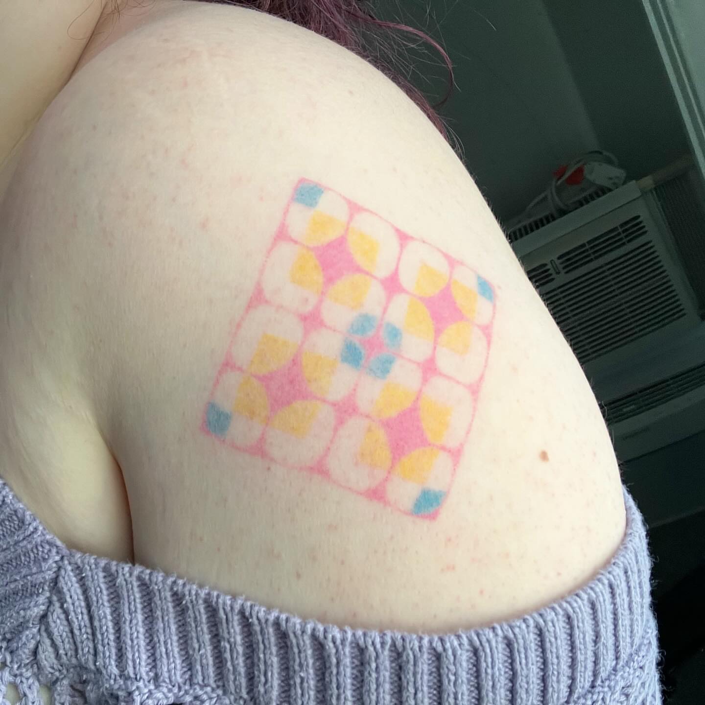 Pixelated cube geometric tattoo on the shoulder by Jill