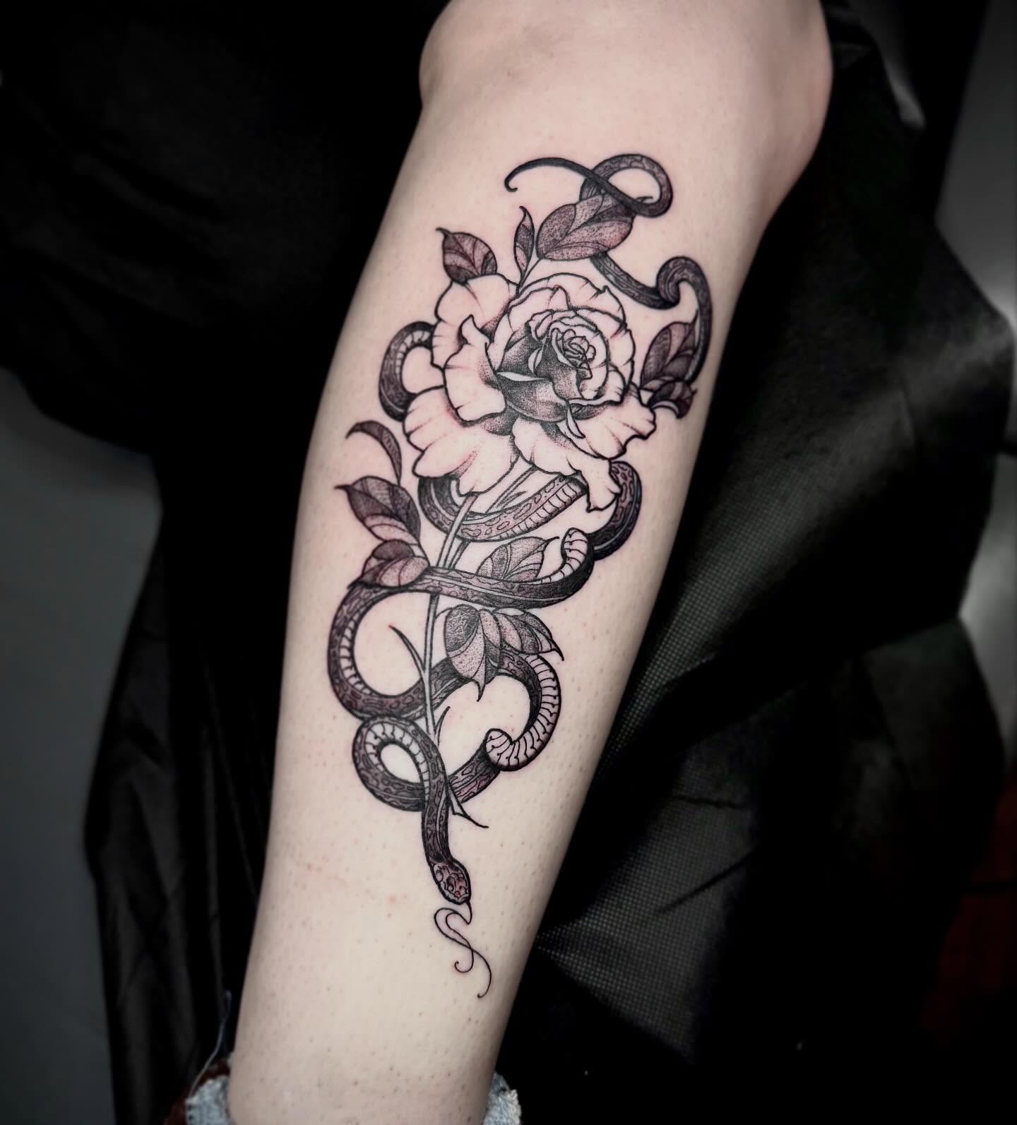 Snake and peony black and grey tattoo on the forearm by 🏵