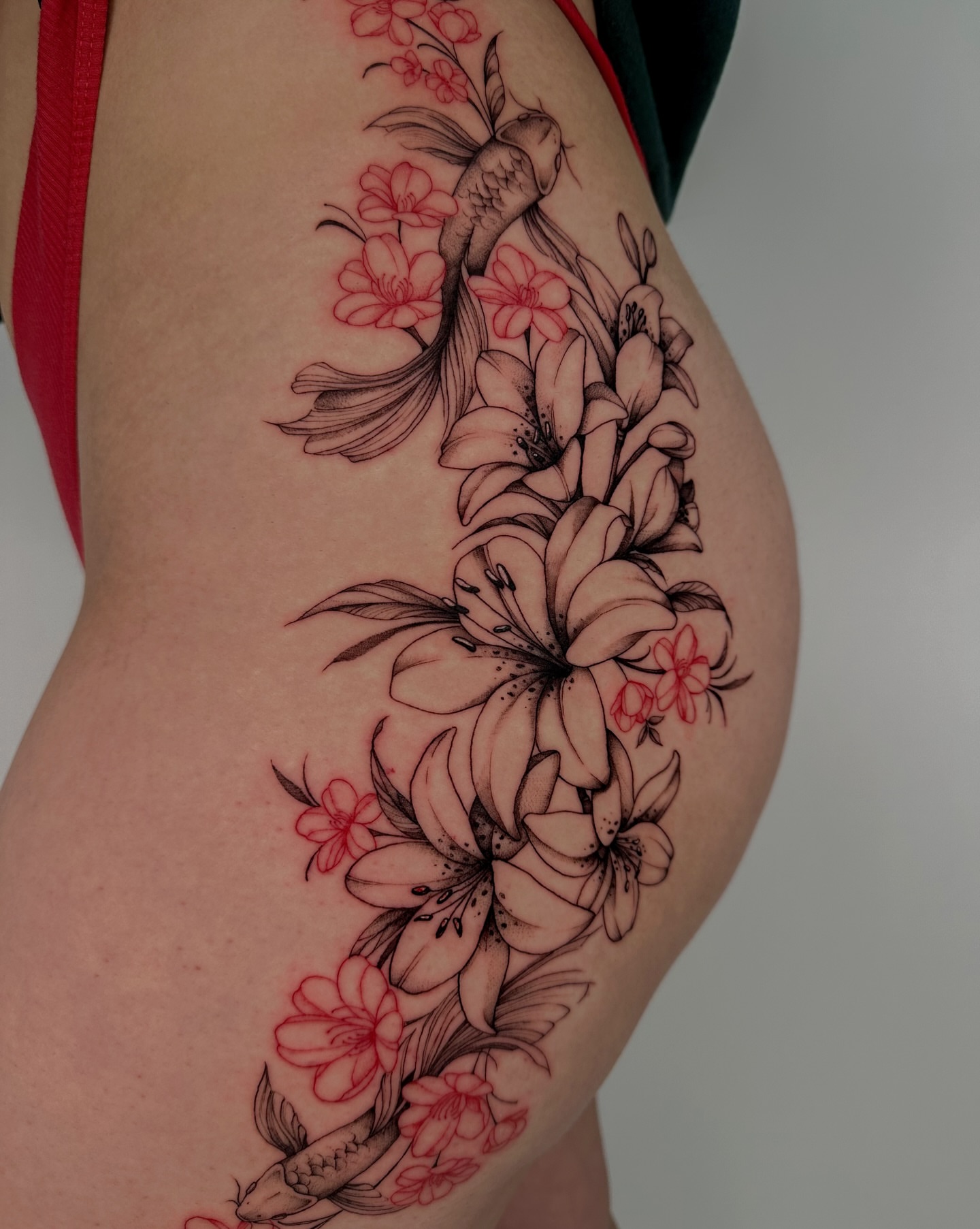 Koi fish and lilies japanese irezumi tattoo on the thigh by Lauren