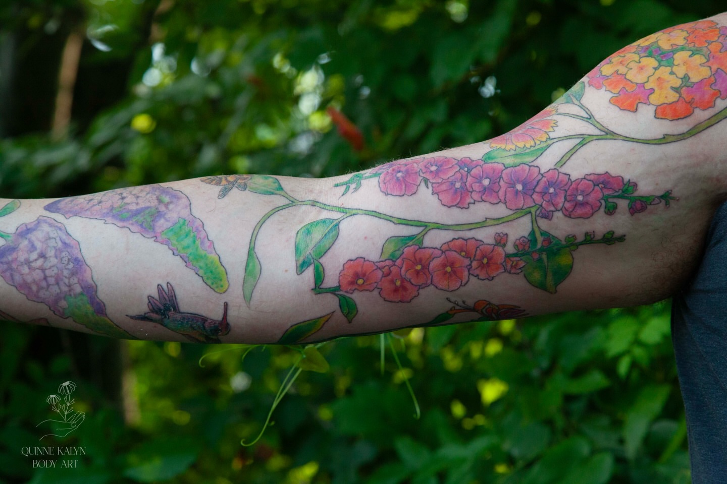 Floral vine new school tattoo on the forearm by Nashville Piercer & Tattoo Artist ✨ Quinne