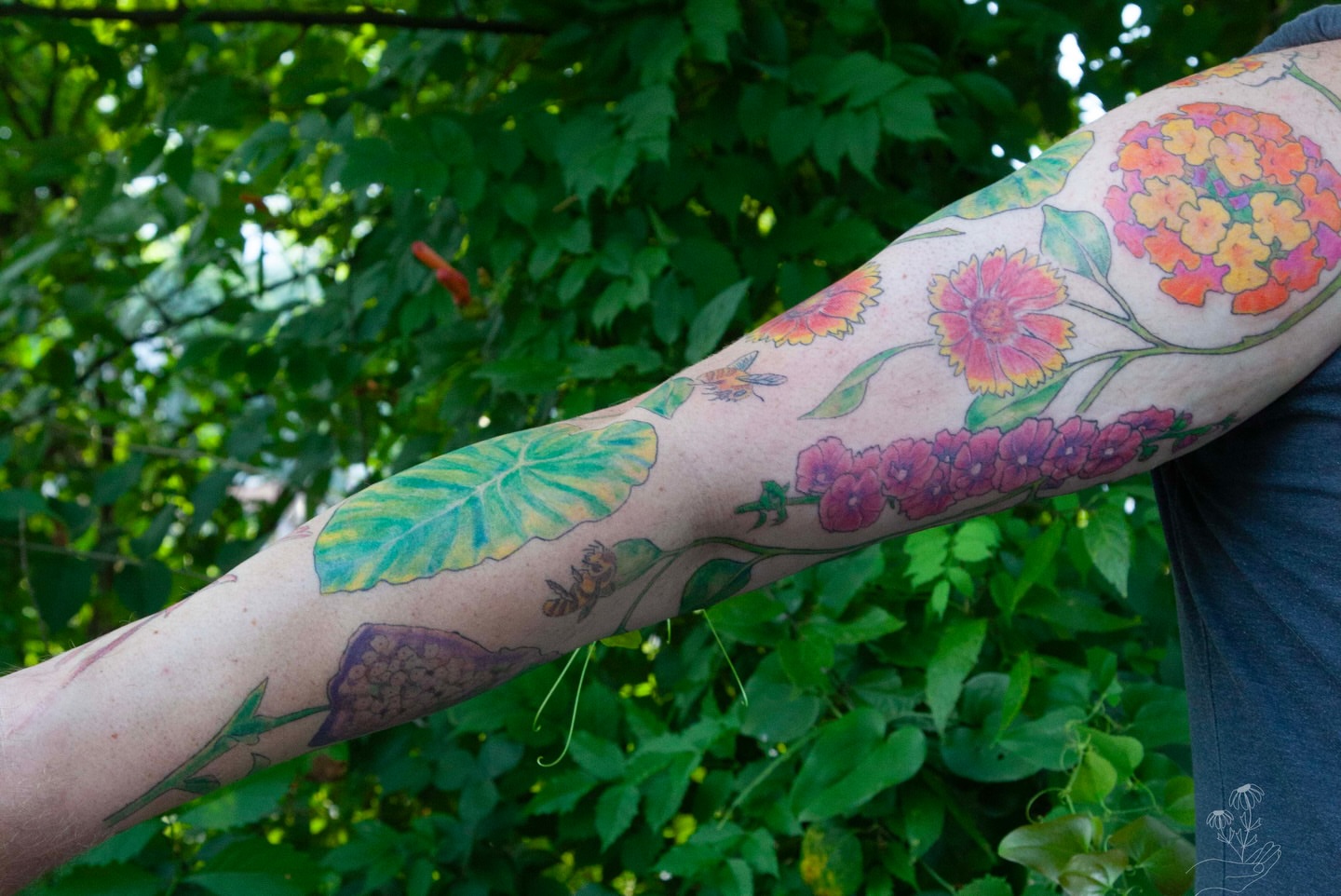 Floral arrangement new school tattoo on the forearm by Nashville Piercer & Tattoo Artist ✨ Quinne