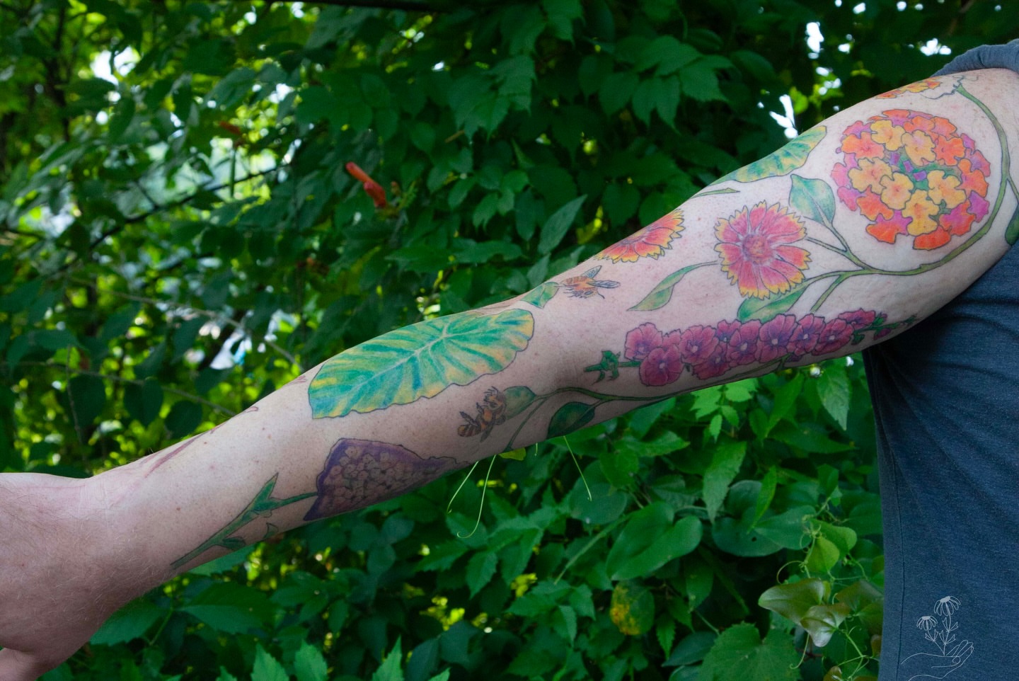 Floral vine new school tattoo on the forearm by Nashville Piercer & Tattoo Artist ✨ Quinne