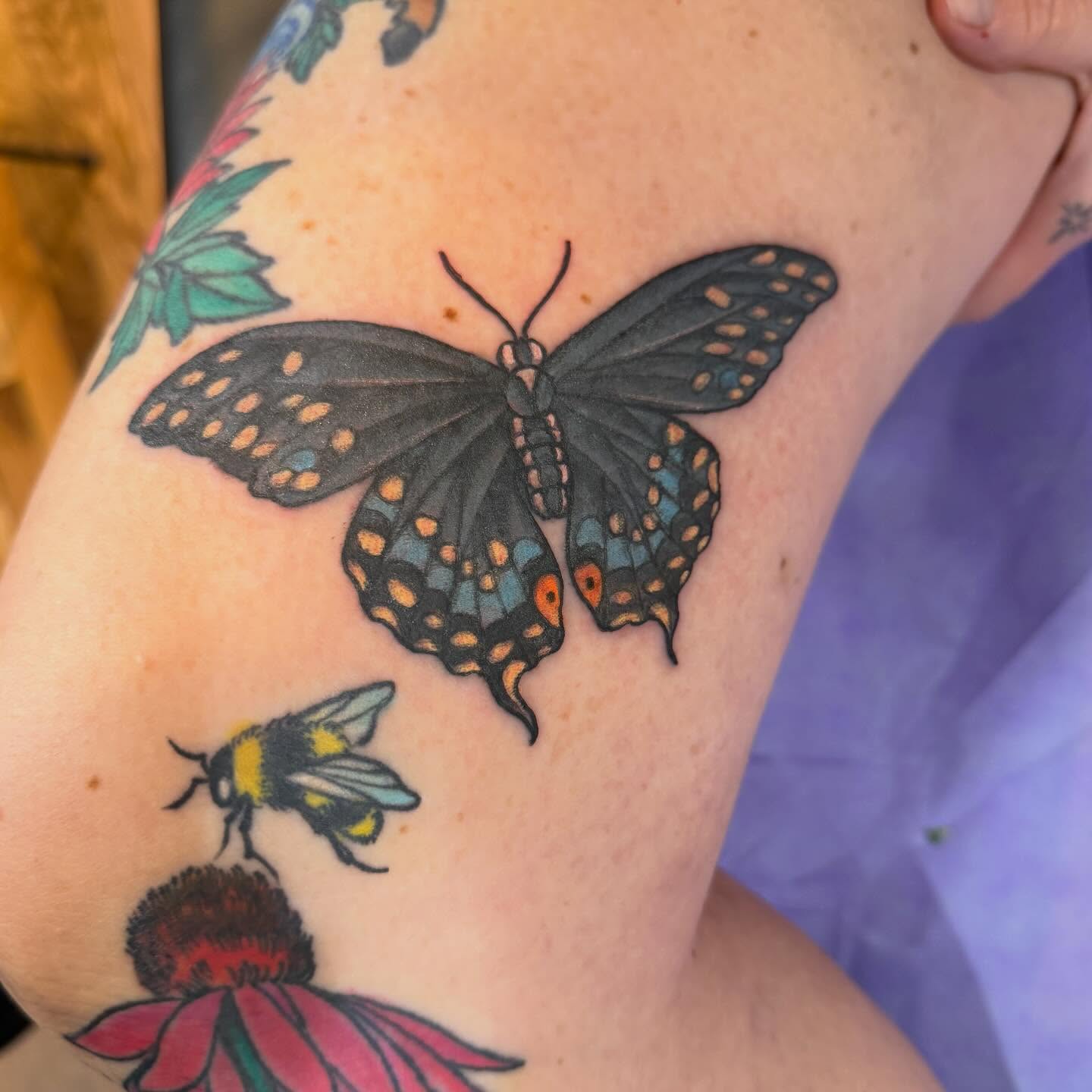 Butterfly dotwork tattoo on the forearm by Laura Saadati Kepper