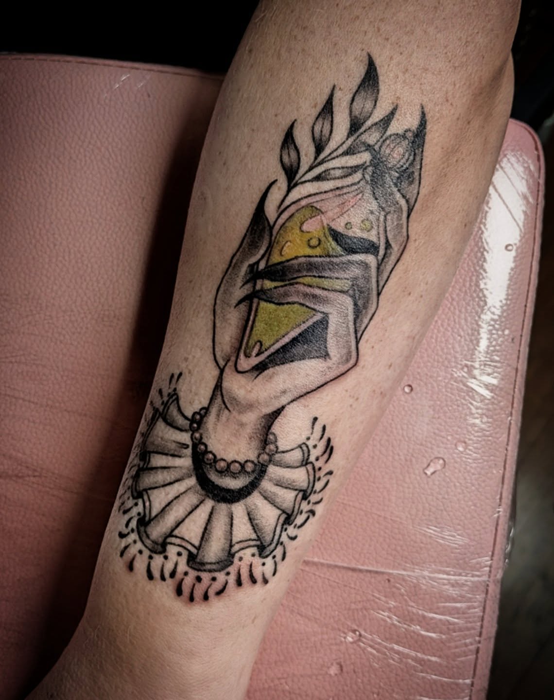 Ruffled collar American traditional tattoo on the forearm by Shannon