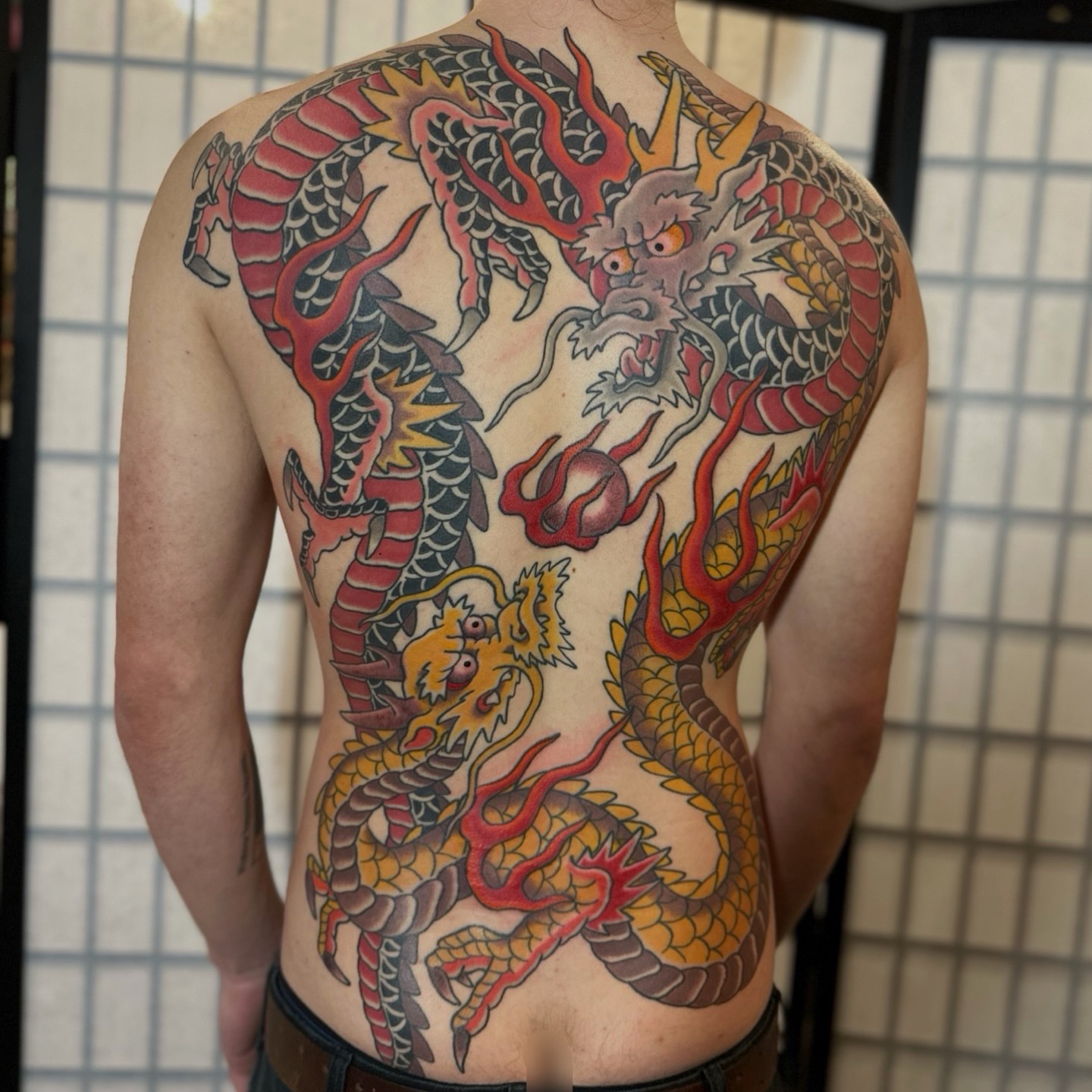 Dragons japanese irezumi tattoo on the back by Daniel Skillingstead