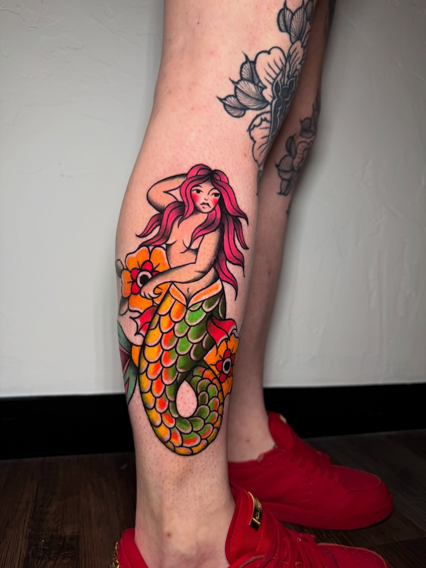Mermaid American traditional tattoo on the calf by Tattoo Artist Los Angeles
