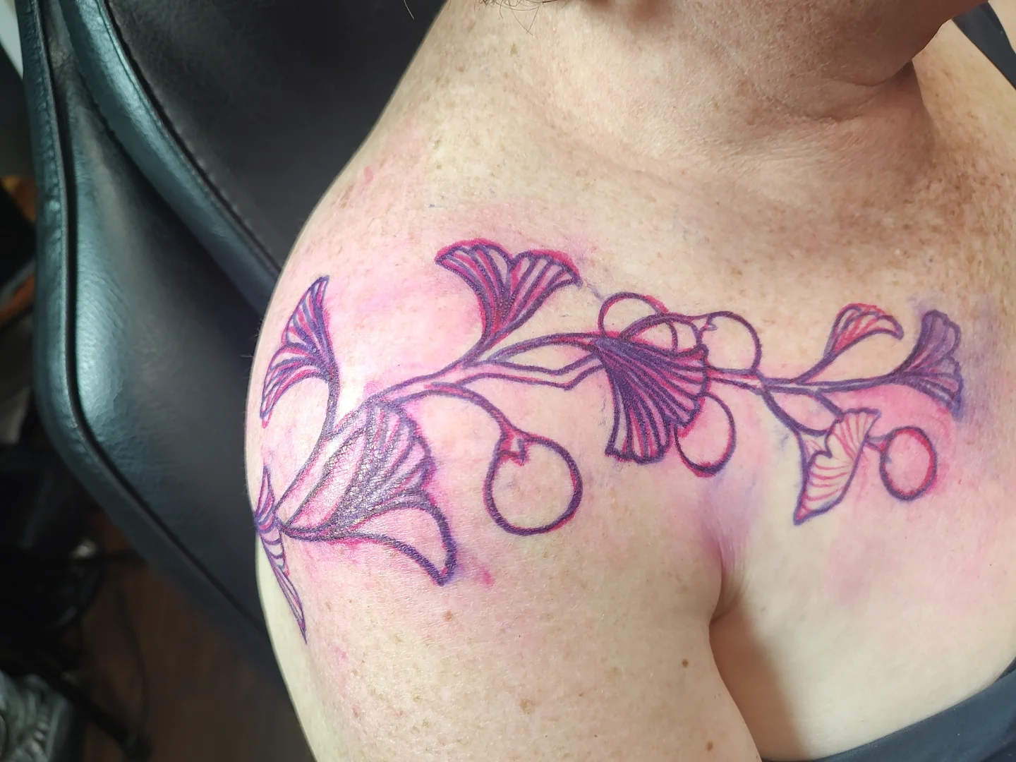Gingko leaves new school tattoo on the shoulder by Jennifer Fowler