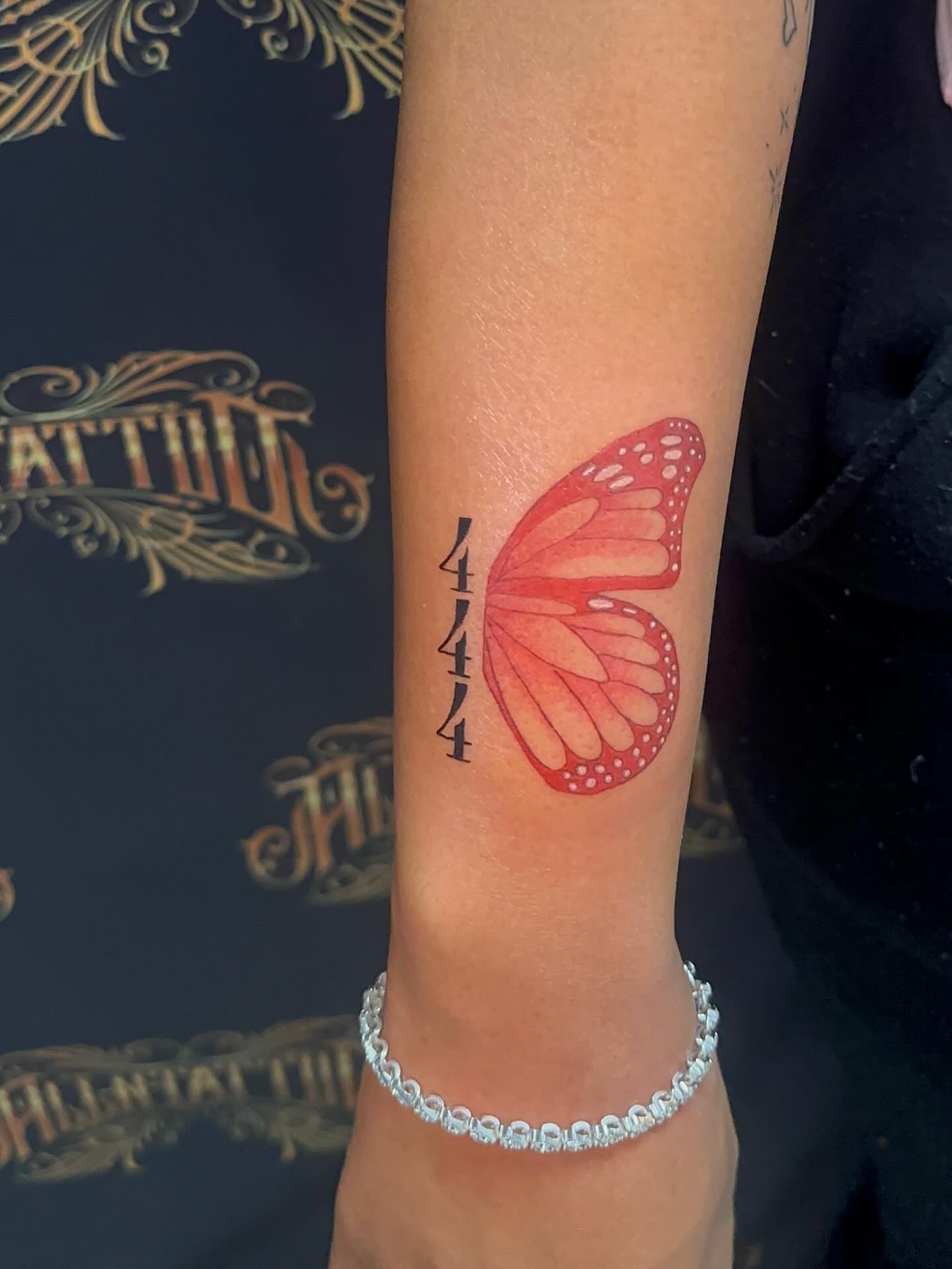 Butterfly watercolor tattoo on the forearm by Cherry Tats🍒
