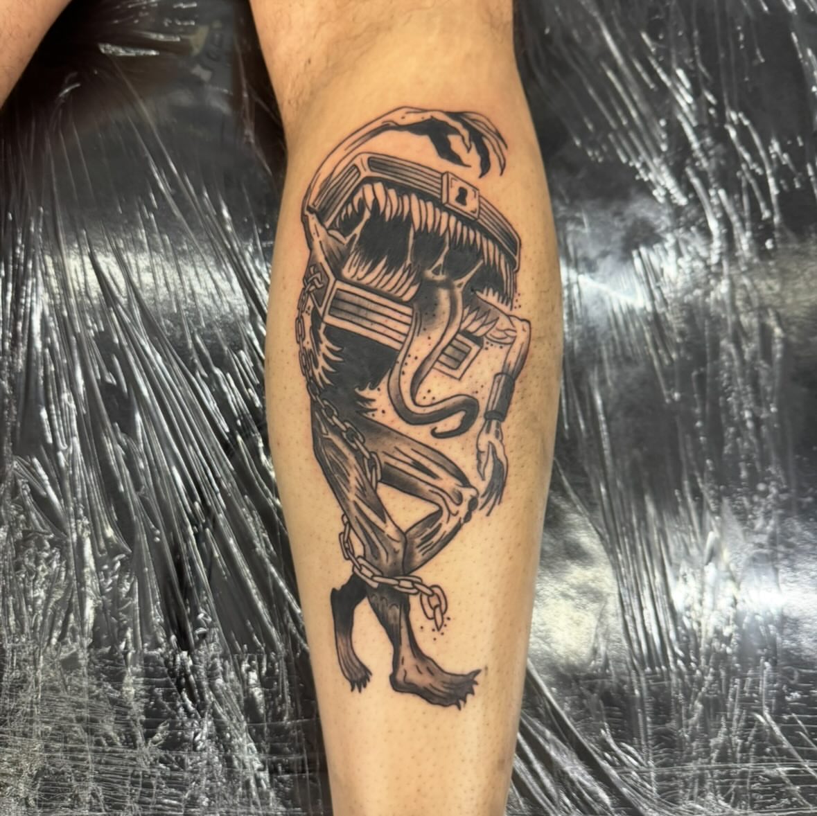 Alien creature black and grey tattoo on the forearm by Willi Tattoos👹