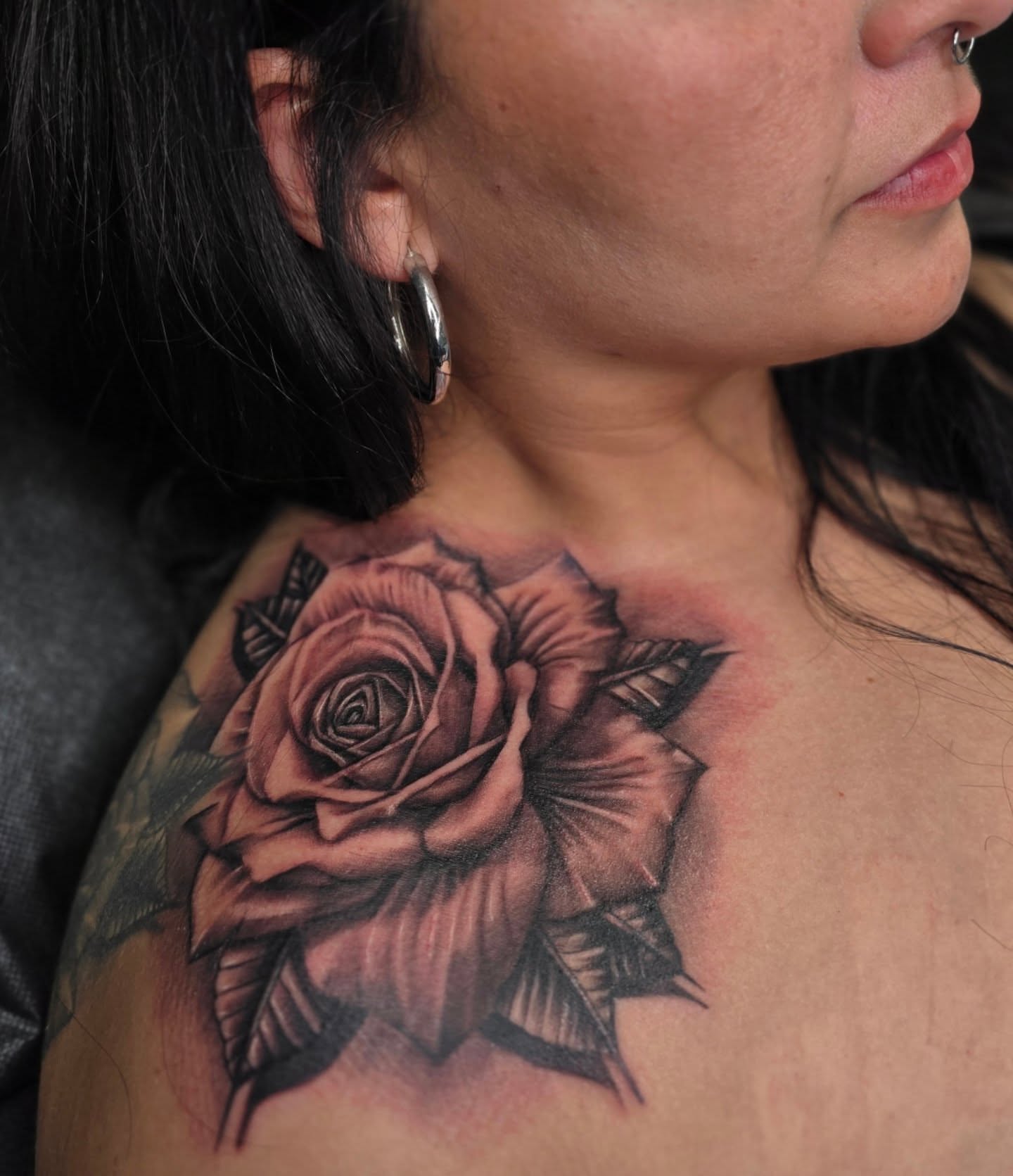 Rose realism tattoo on the chest by Richie Garcia, Hesperia, California