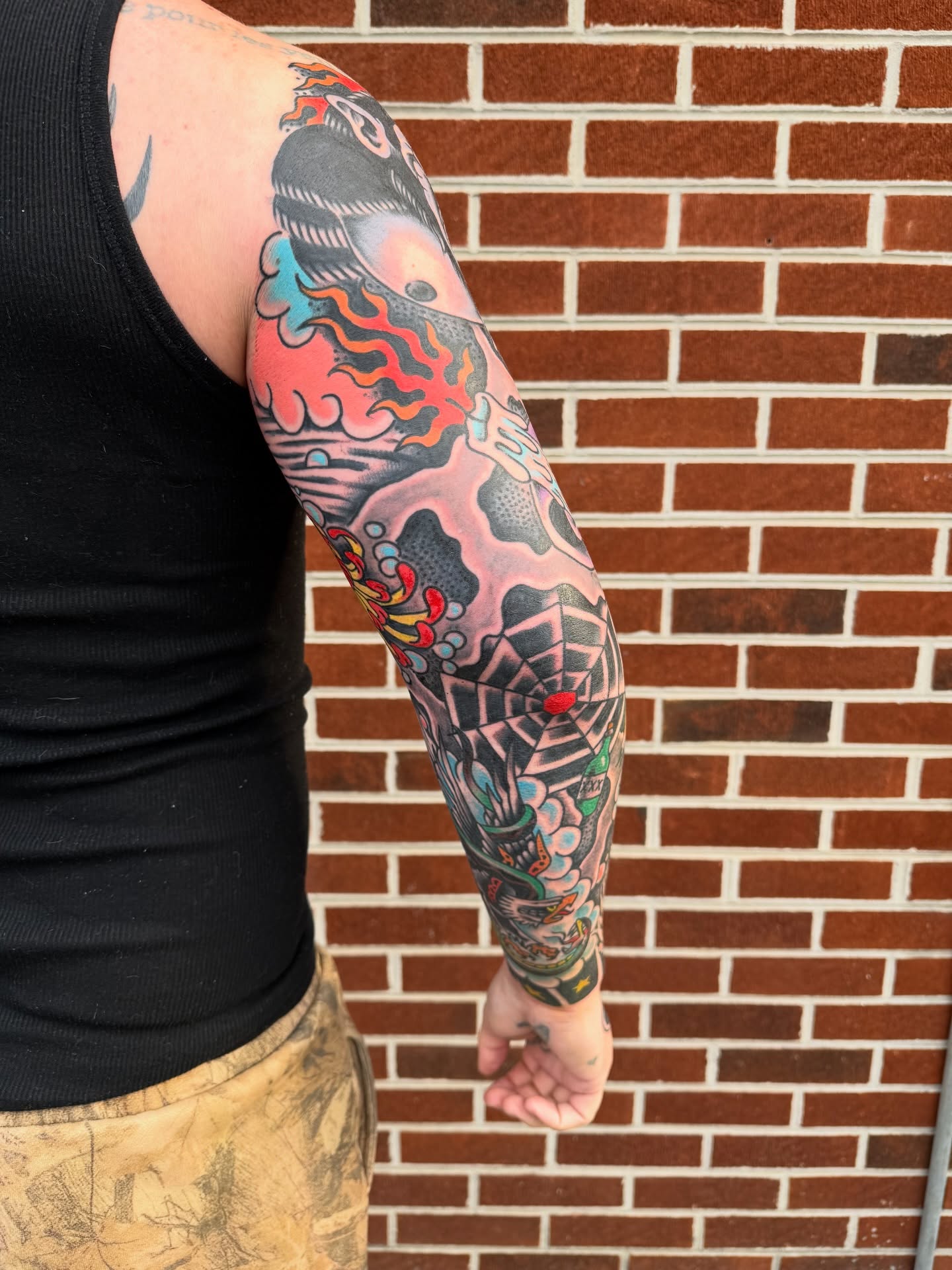 Wave and sun American traditional tattoo on the forearm by 🌈KNOXVILLE’S FAVORITE TATTOO ARTIST 👽 마법 버섯