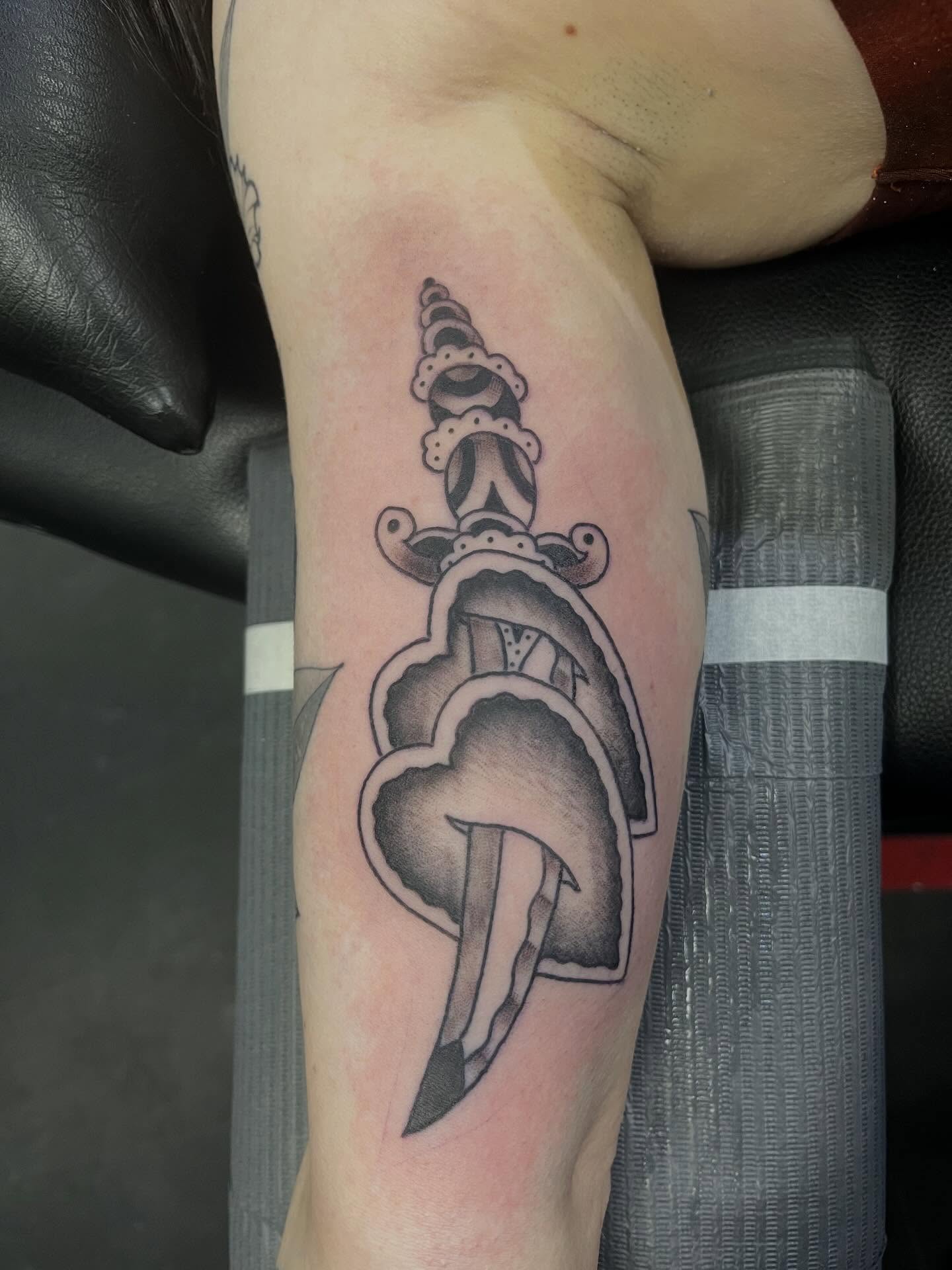Knife and cloud black and grey tattoo on the forearm by CRAIG B⛓️ Cincinnati Tattoo Artist