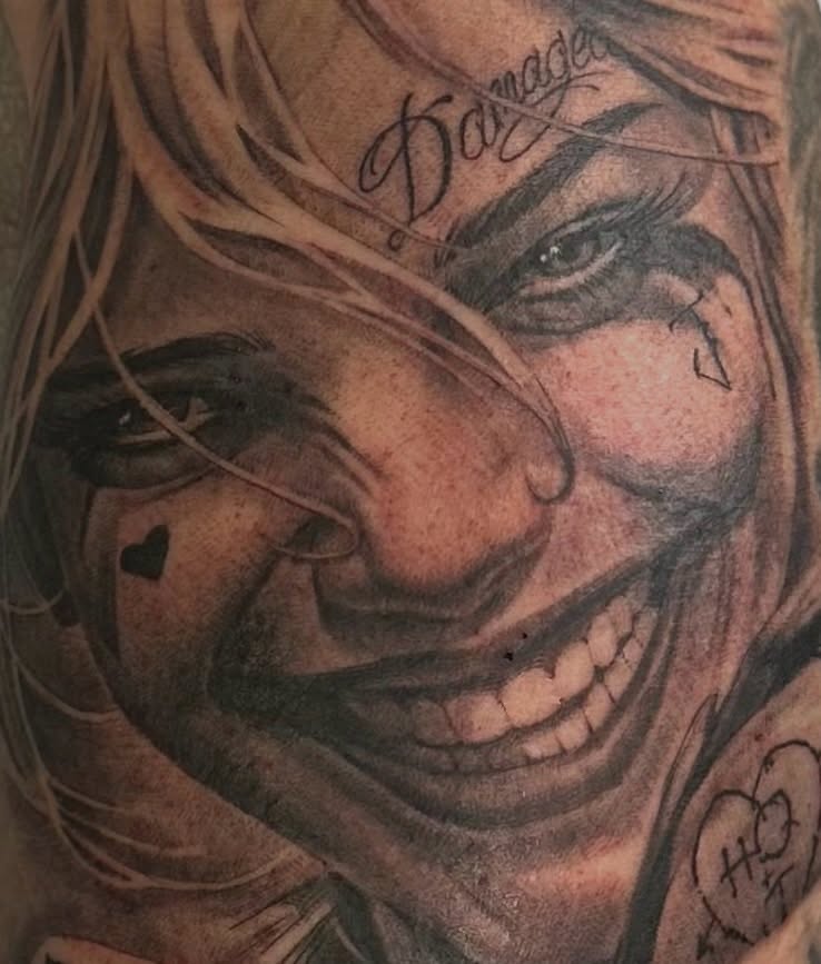 Clown face realism tattoo on the forearm by Matthew Doherty