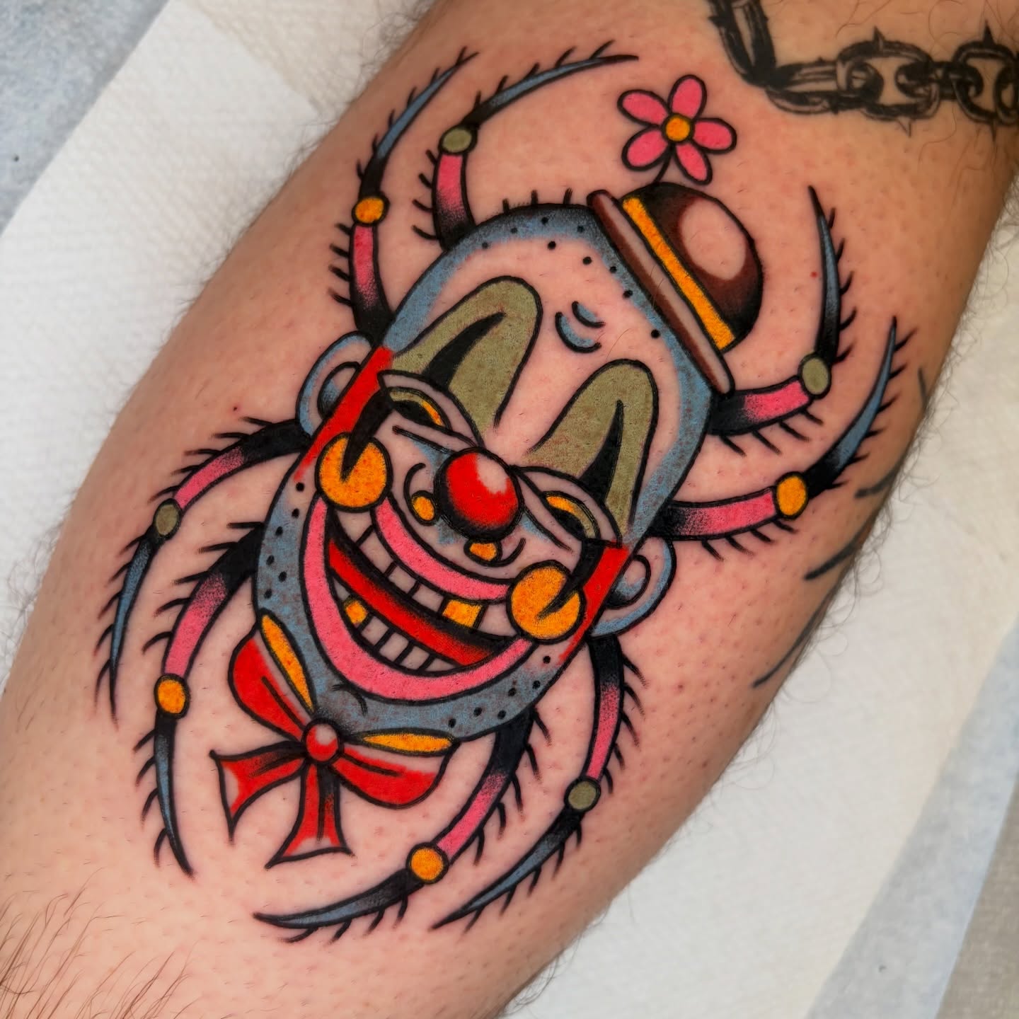 Clown American traditional tattoo on the forearm by rachael