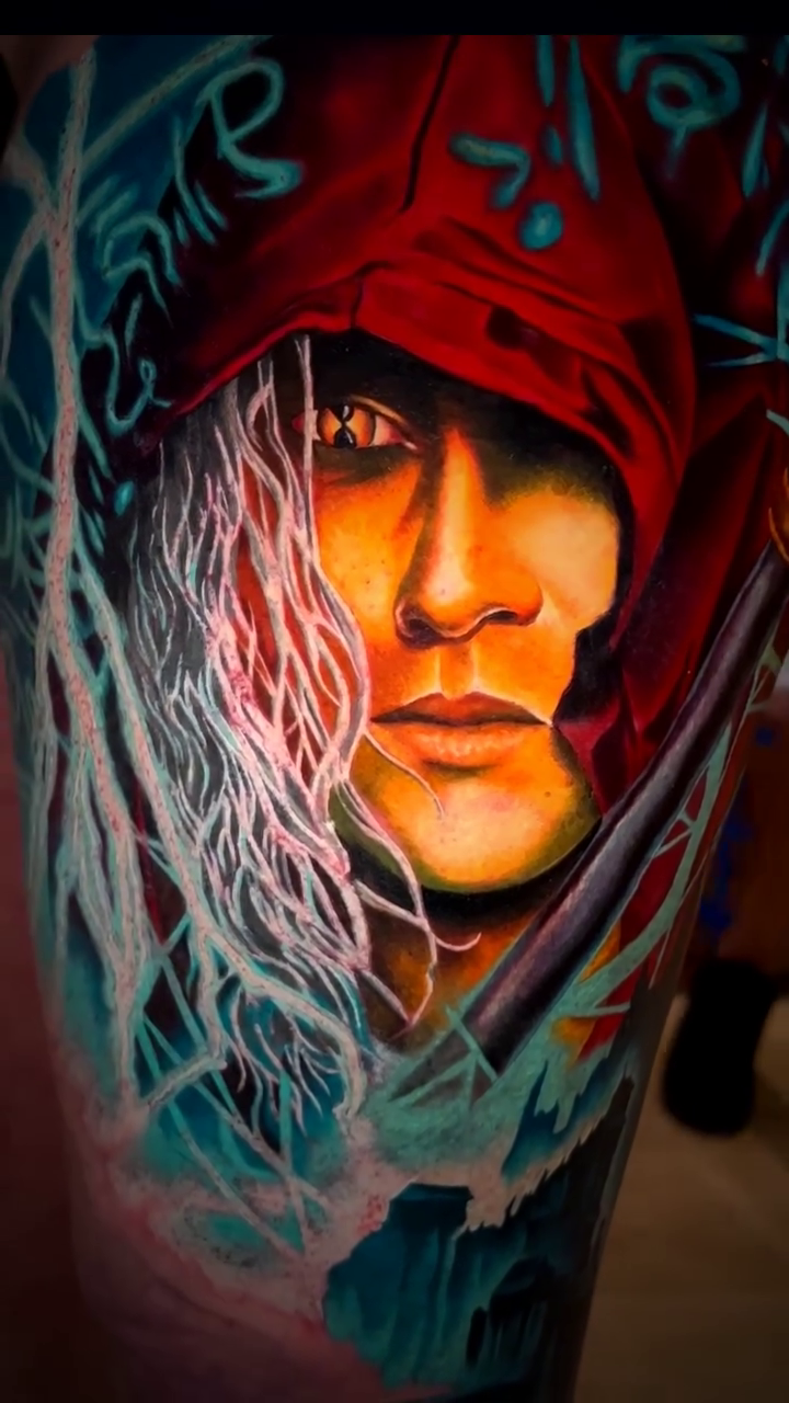 Hooded figure and staff realism tattoo by Noelin Wheeler