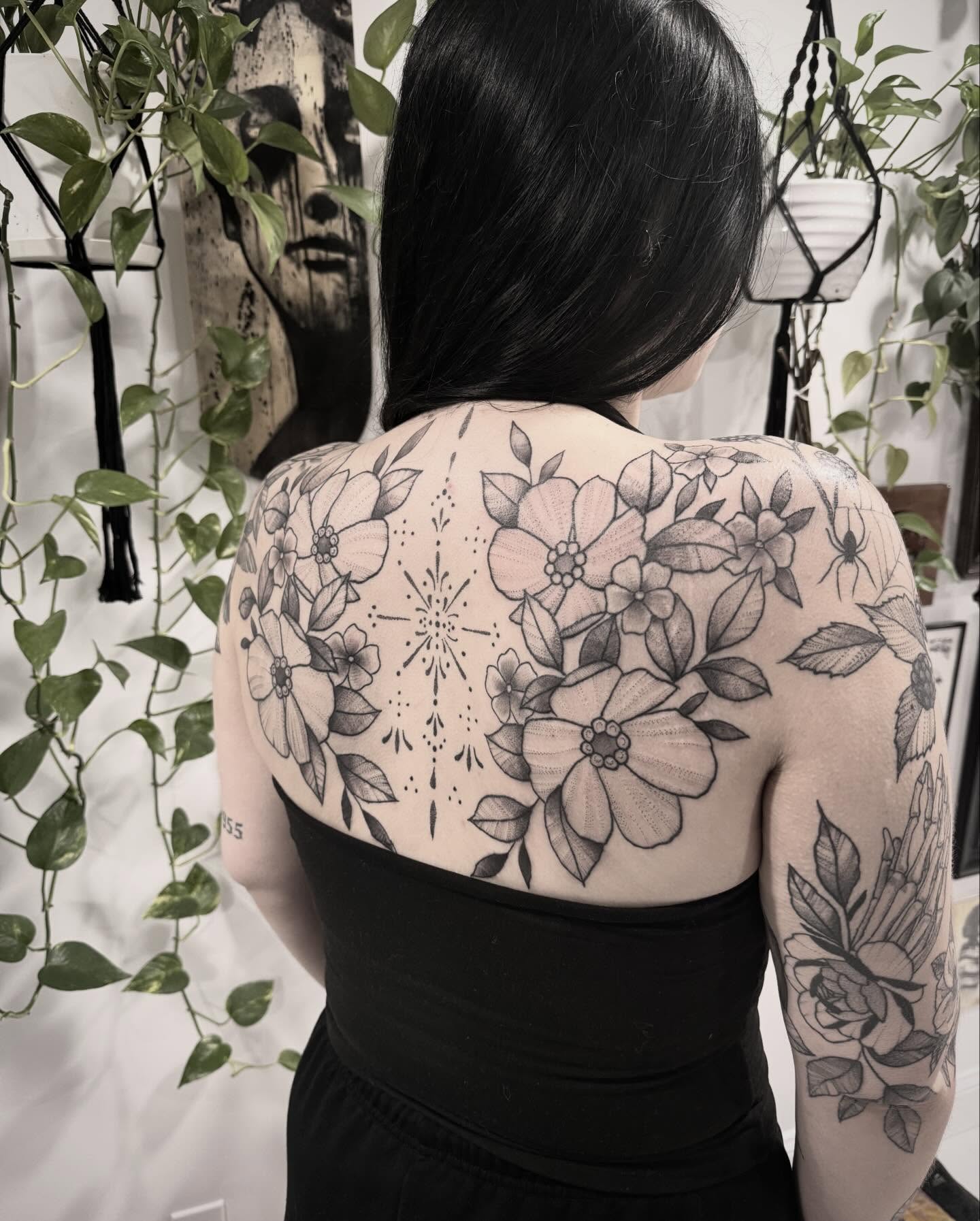 Floral bouquet black and grey tattoo on the back by Shannon Misitano