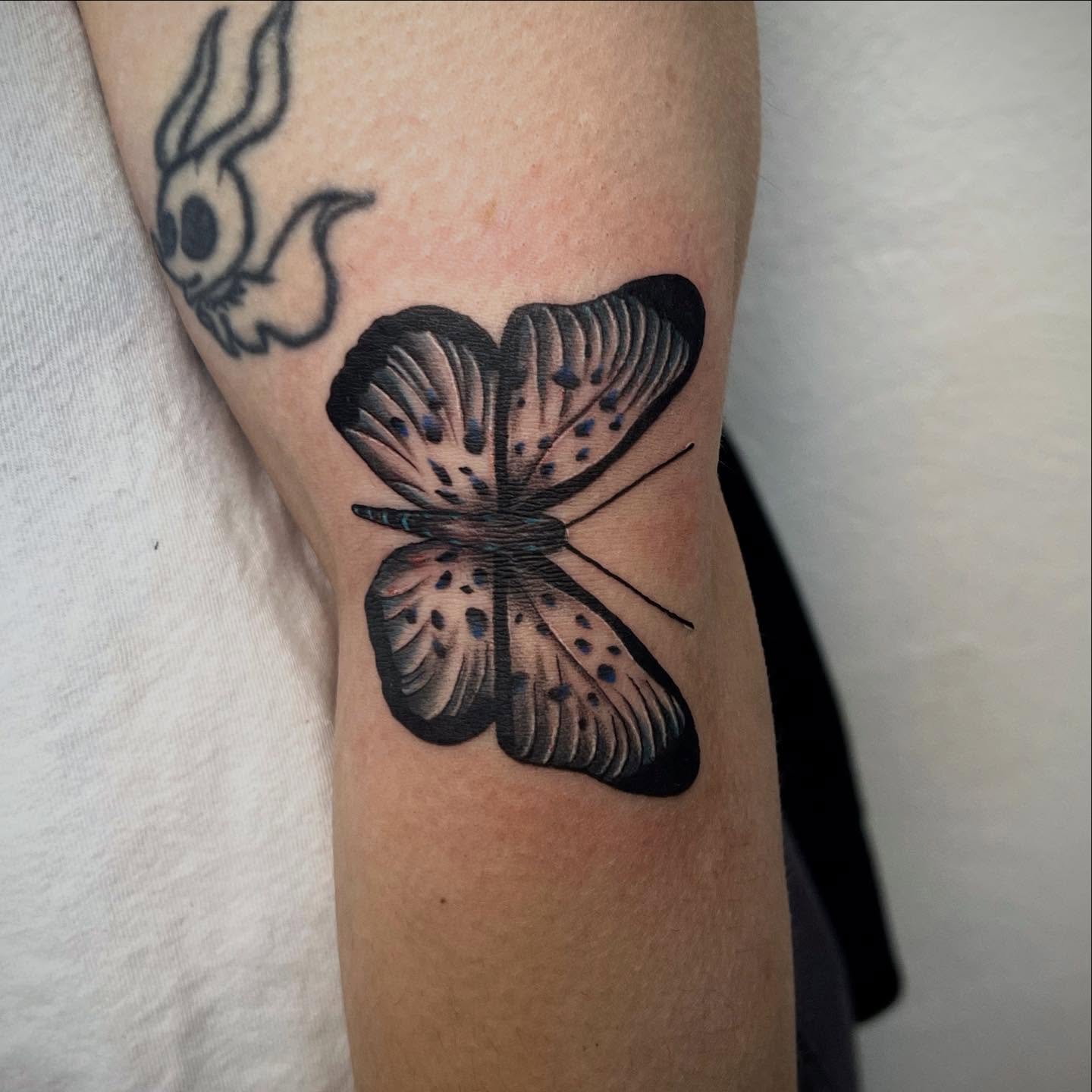 Butterfly dotwork tattoo on the forearm by Amber Rose