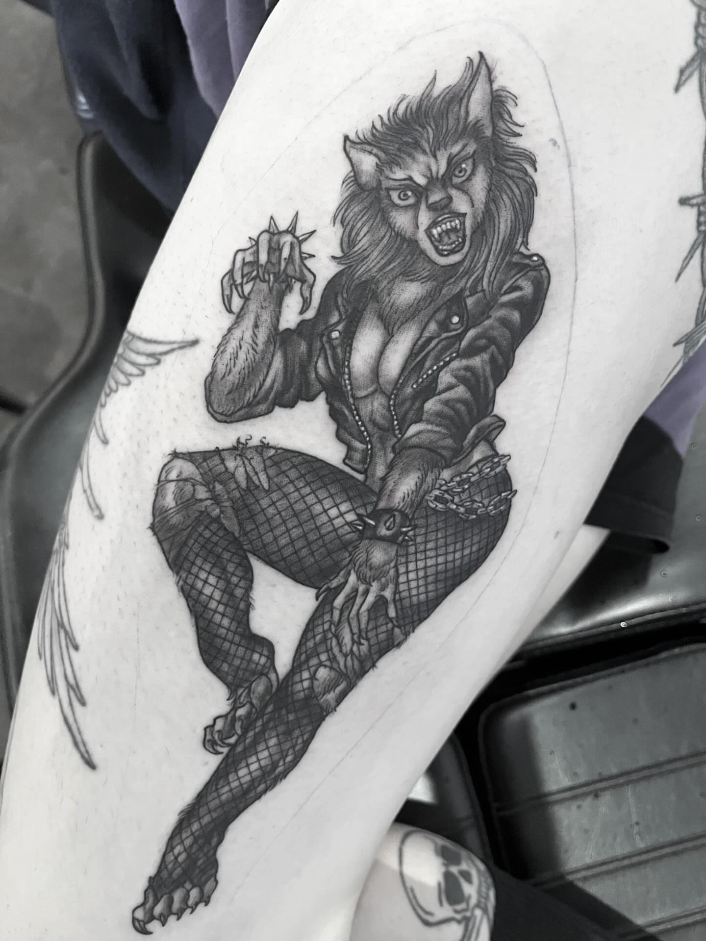 Werewolf woman realism tattoo on the thigh by Nathan Esteras