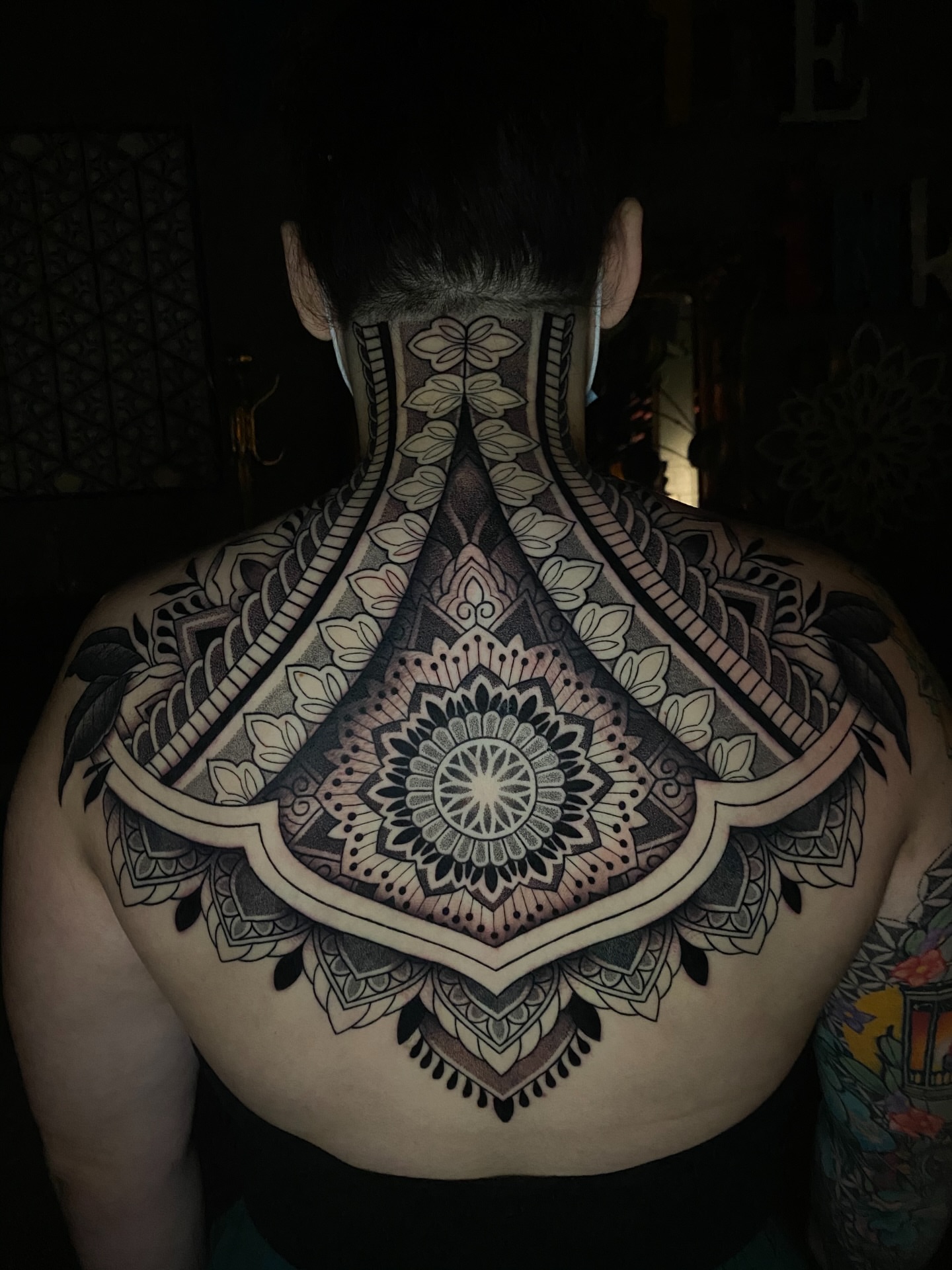Mandala geometric tattoo on the back by Jason Call