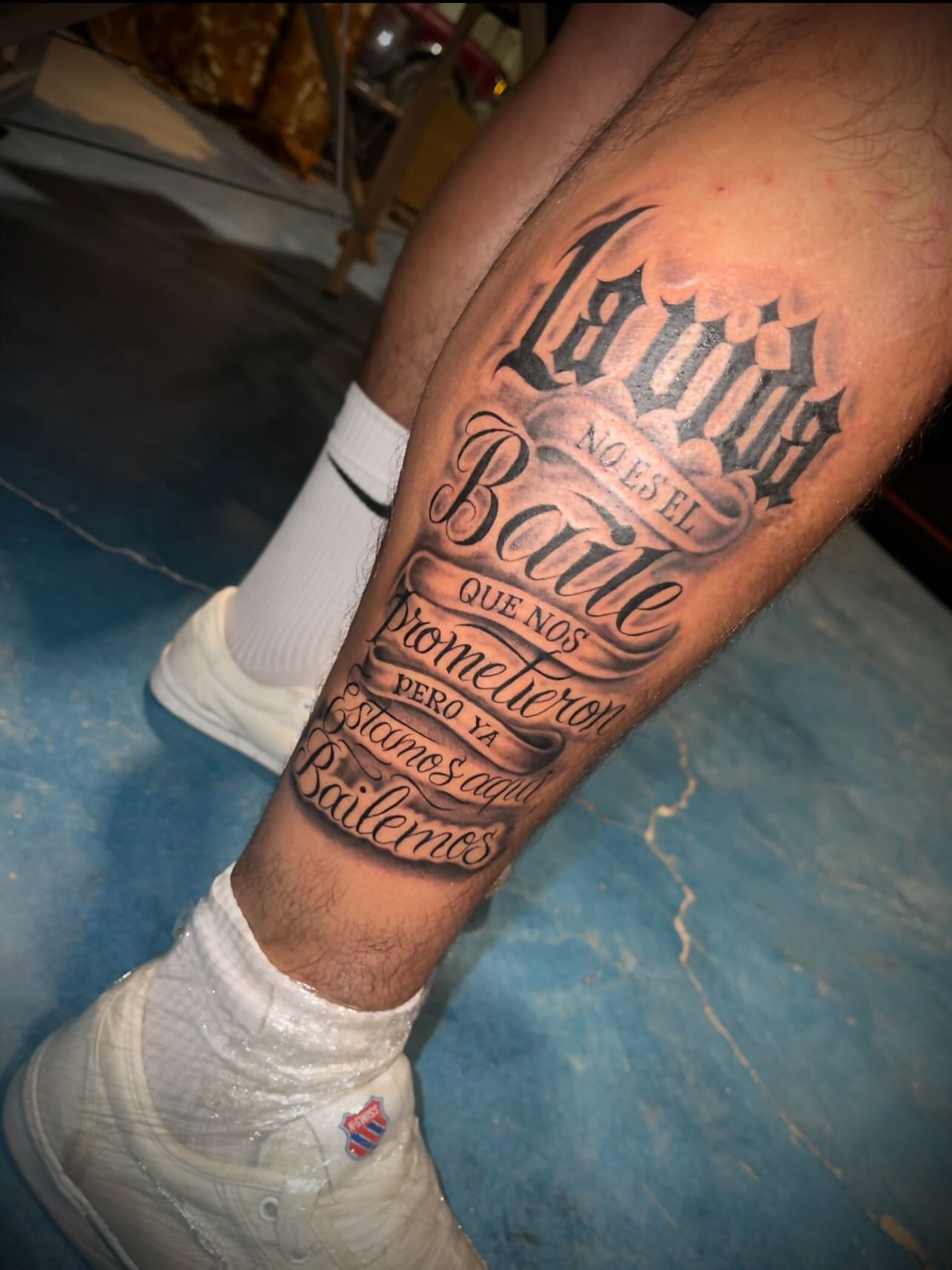 Dance quote lettering script tattoo on the forearm by Tu SanchoTattoos