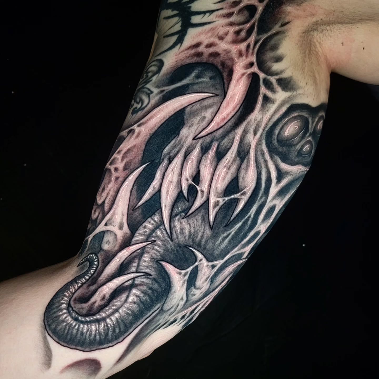 Tattoo by @necronomiconnor — dark_realism, black_and_grey
