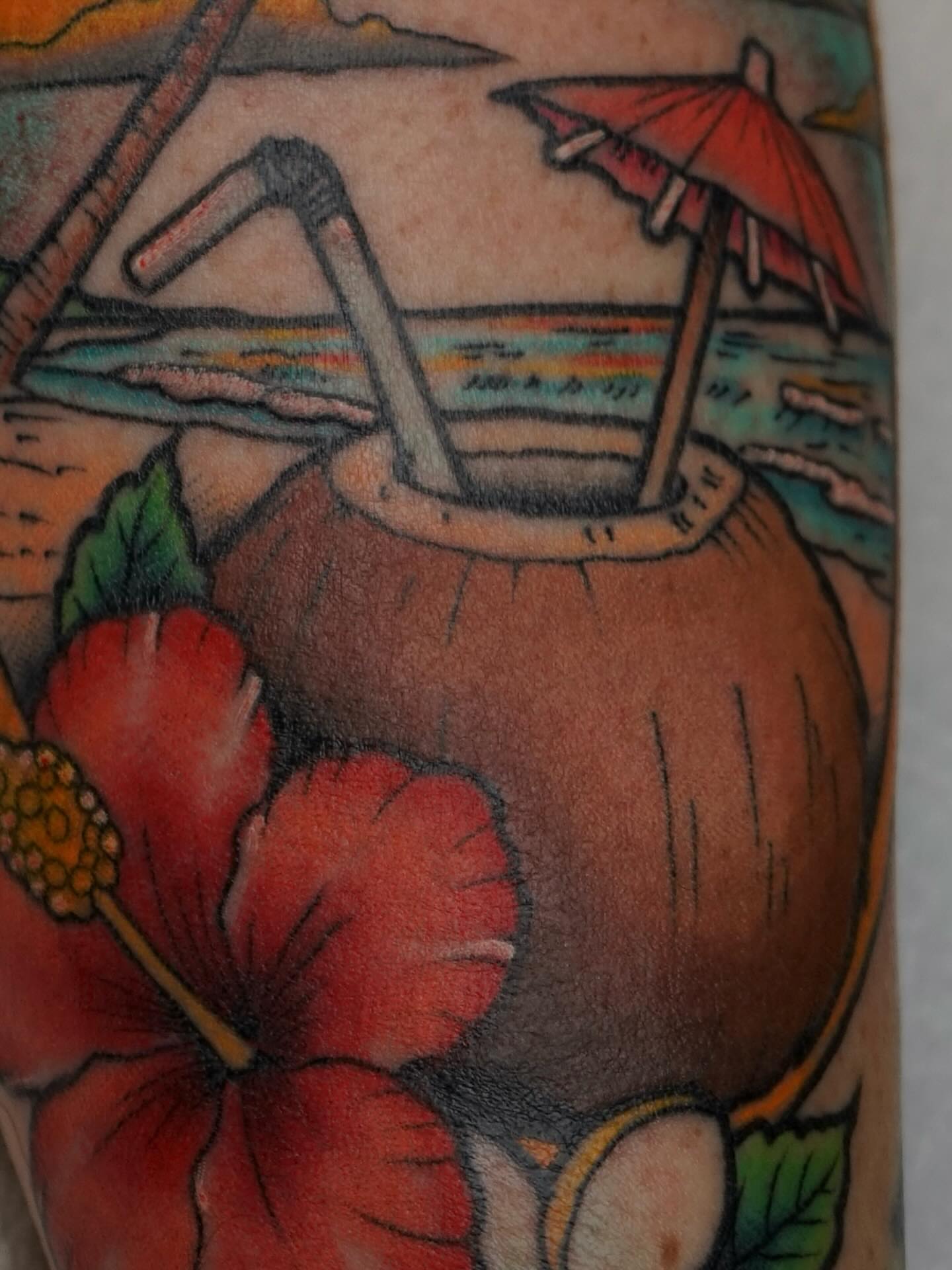 Coconut drink American traditional tattoo on the forearm by Tyler Harrington